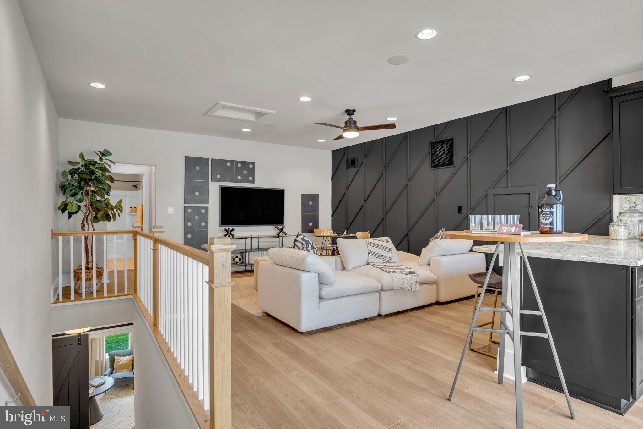 39 Reedgrass Way Gettysburg, PA 17325 - Photo 12 of 44 a living room with furniture a flat screen tv and a table