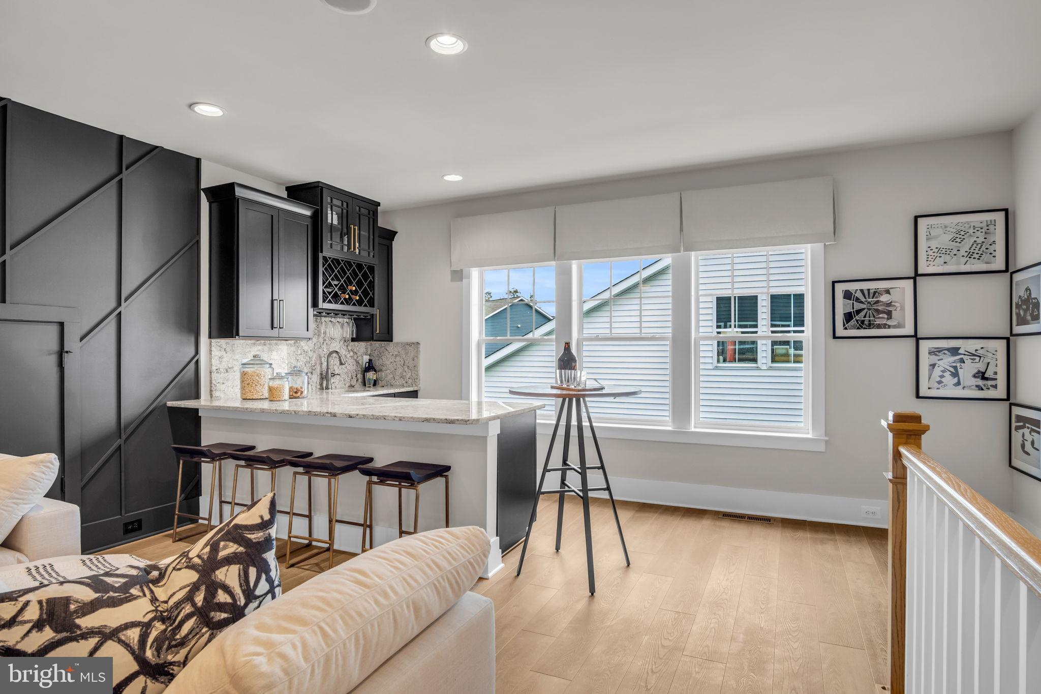 39 Reedgrass Way Gettysburg, PA 17325 - Photo 13 of 44 a living room with furniture a flat screen tv and a table