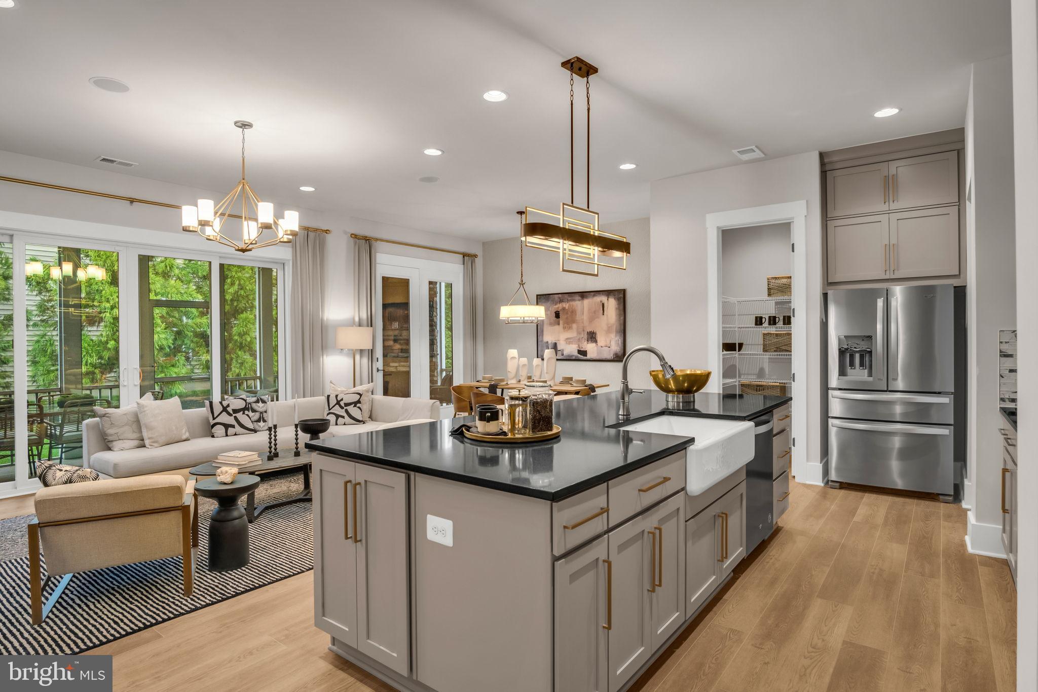 39 Reedgrass Way Gettysburg, PA 17325 - Photo 26 of 44 a kitchen with granite countertop a sink stove and refrigerator