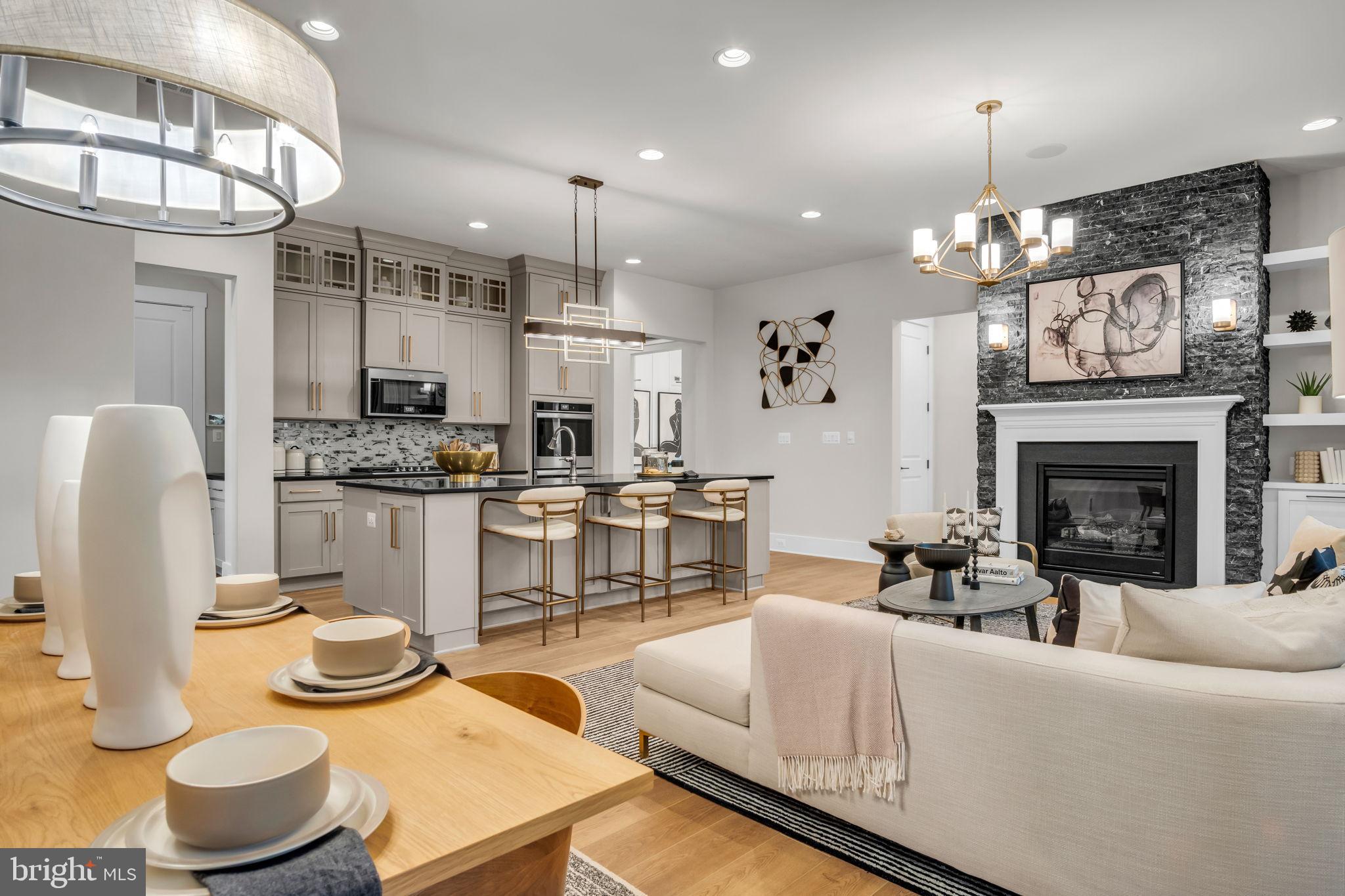 39 Reedgrass Way Gettysburg, PA 17325 - Photo 32 of 44 a living room with fireplace furniture and a chandelier