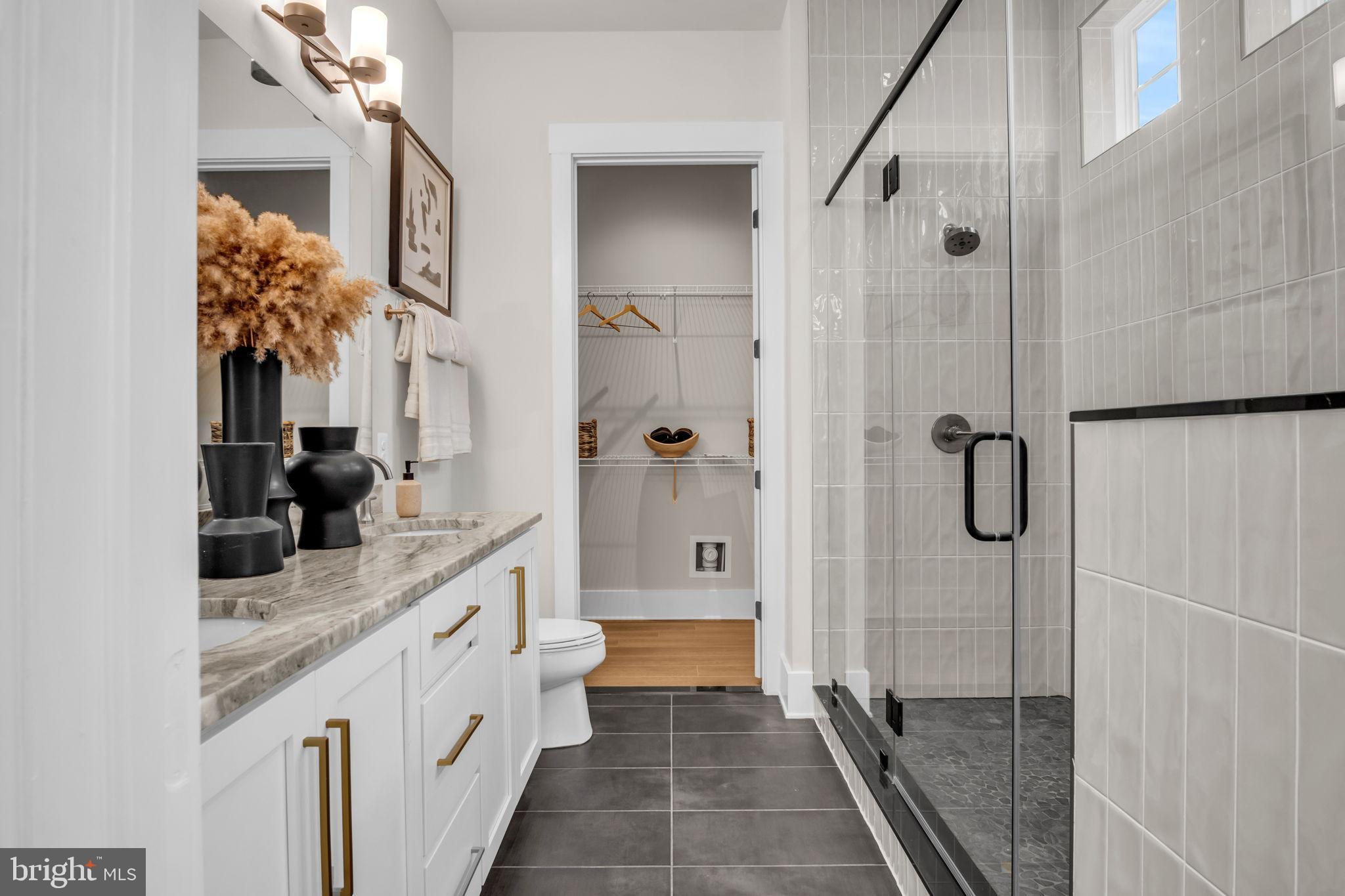 39 Reedgrass Way Gettysburg, PA 17325 - Photo 7 of 44 a bathroom with a granite countertop shower sink and mirror