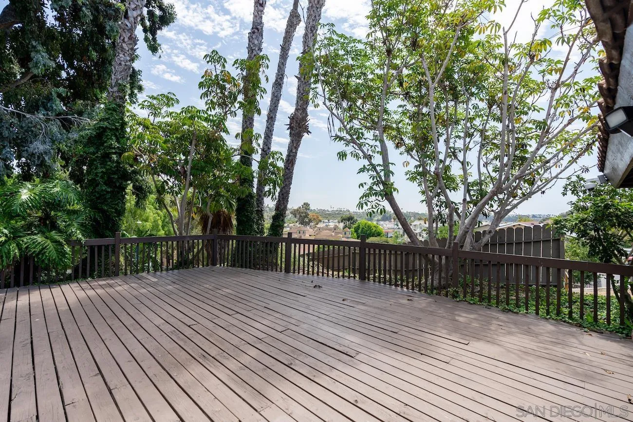 615 Vine Street, Unit 15 Oceanside, CA 92054 - Photo 15 of 23 a view of backyard with wooden floor