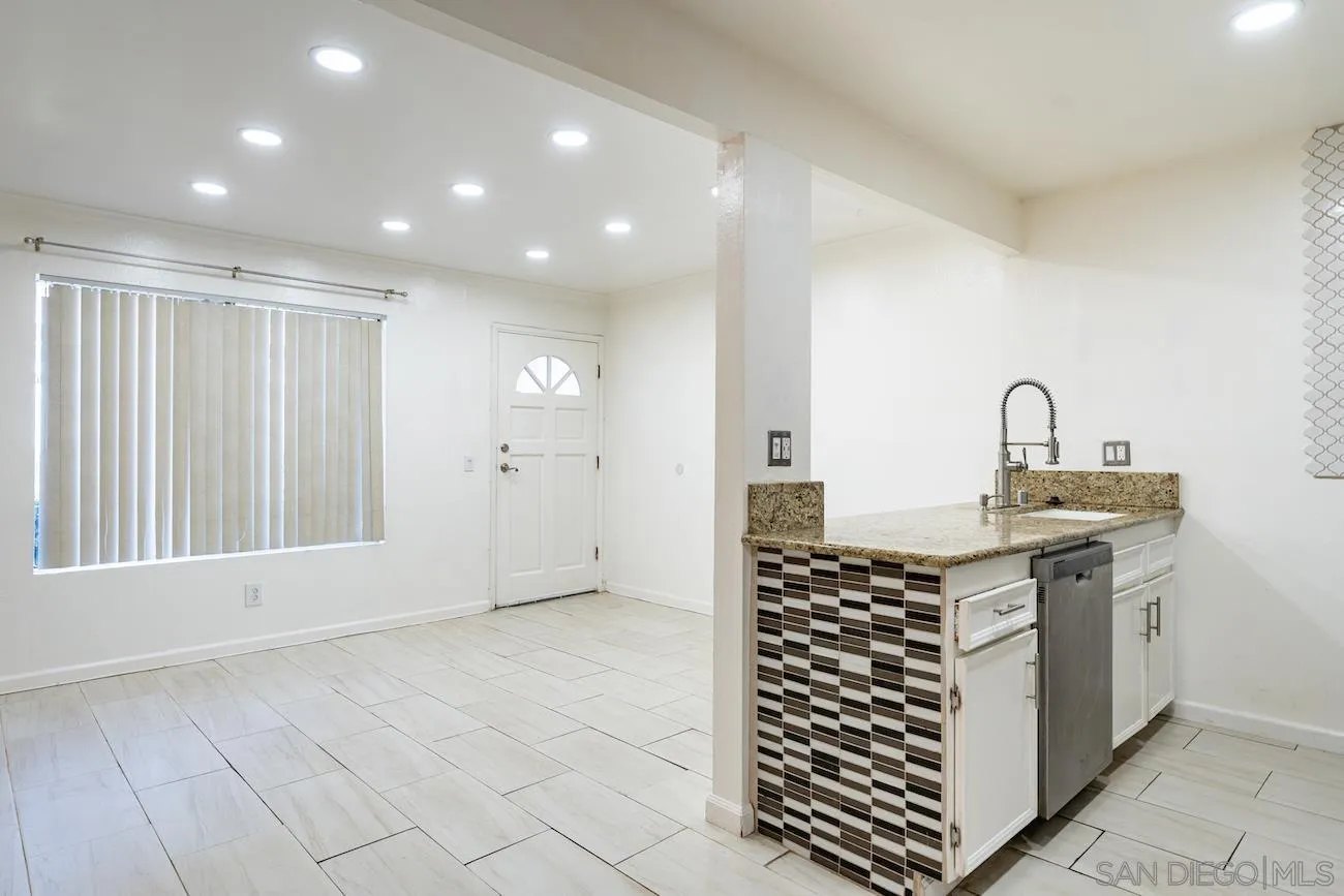 615 Vine Street, Unit 15 Oceanside, CA 92054 - Photo 2 of 23 a kitchen with a sink and cabinets
