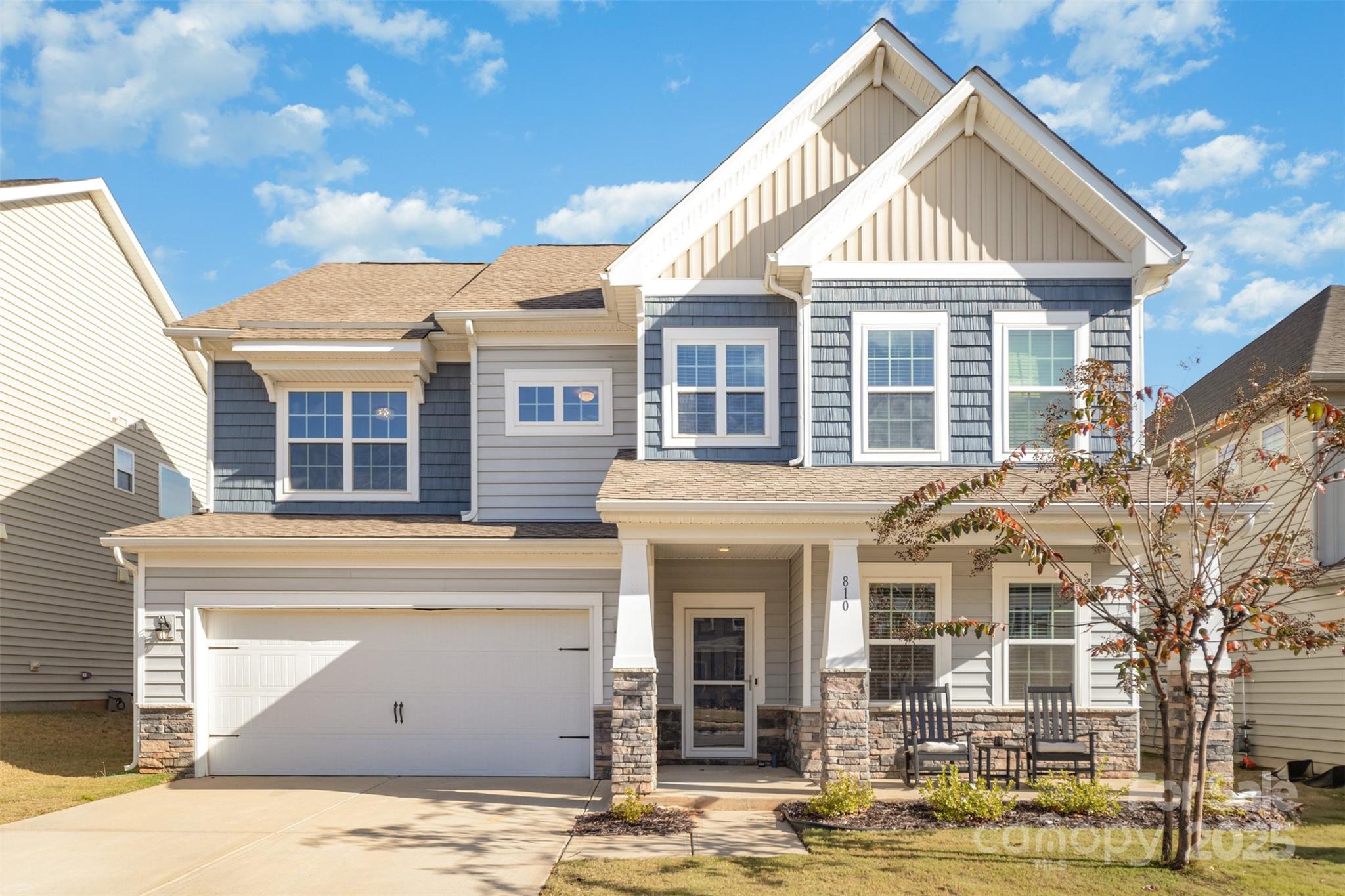 810 Braddock Way Fort Mill, SC 29715 - Photo 1 of 38 a front view of a house with a garden
