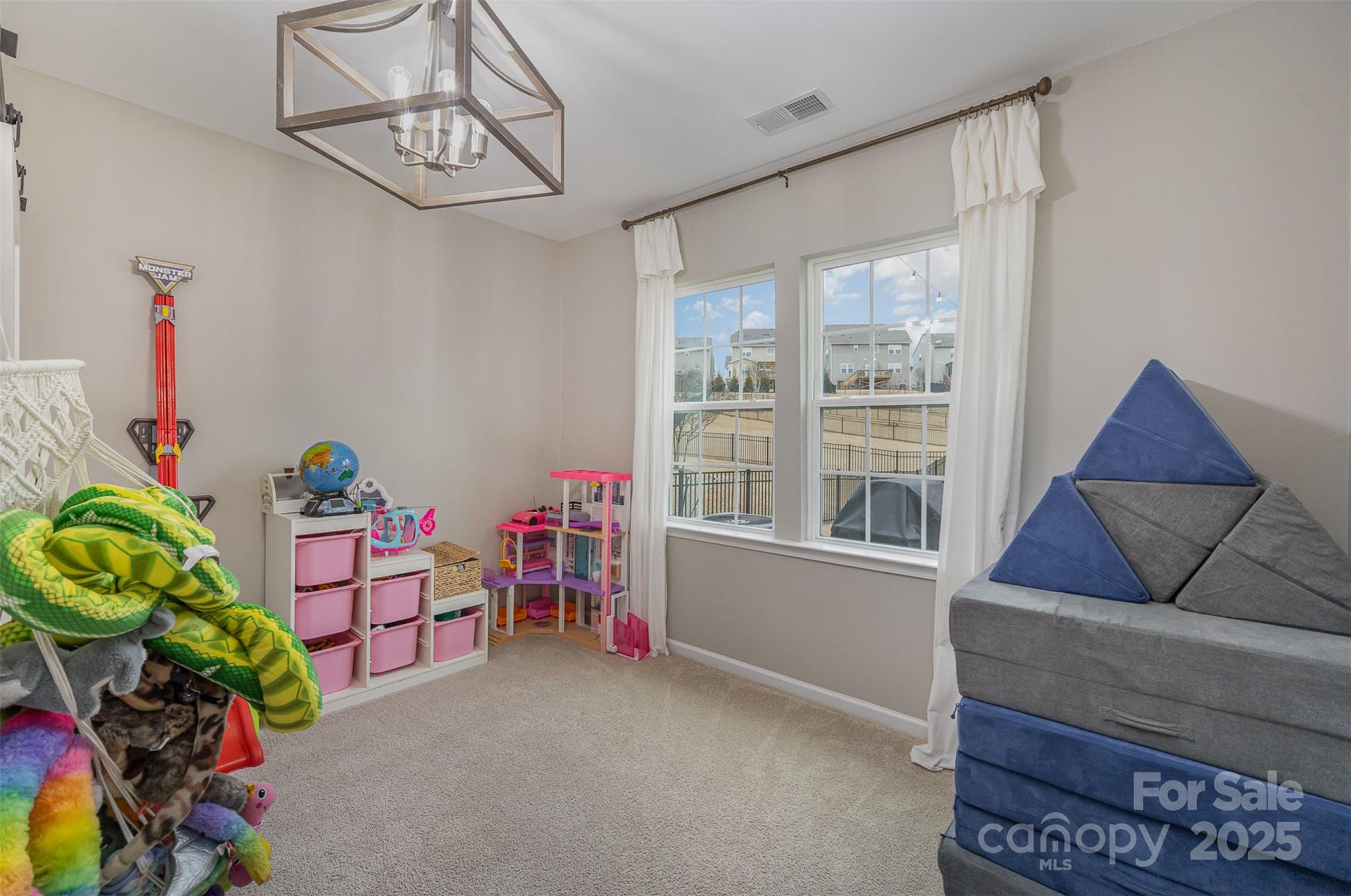 810 Braddock Way Fort Mill, SC 29715 - Photo 19 of 38 a bedroom with furniture and a window