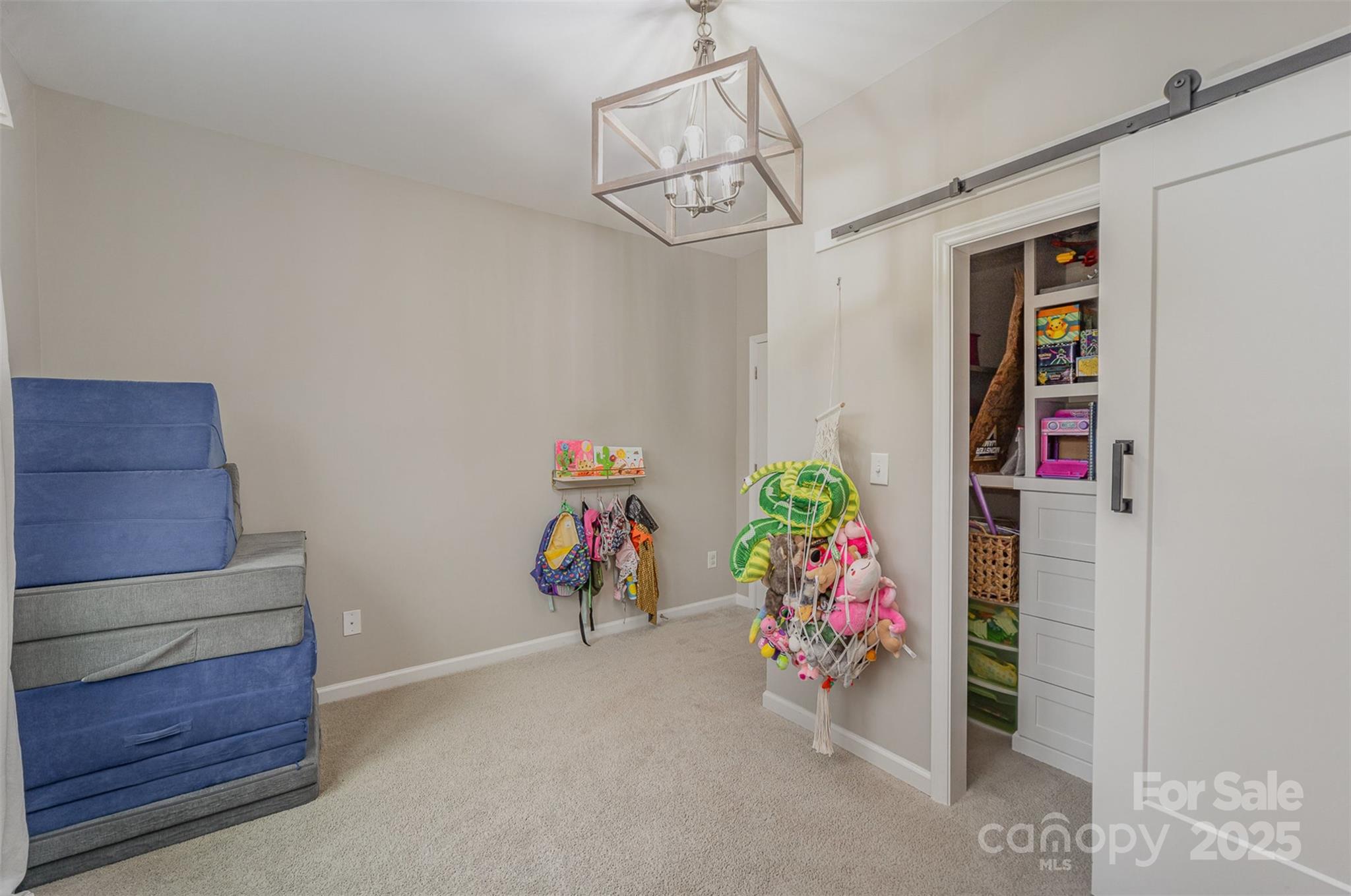 810 Braddock Way Fort Mill, SC 29715 - Photo 20 of 38 a view of a hallway with toys