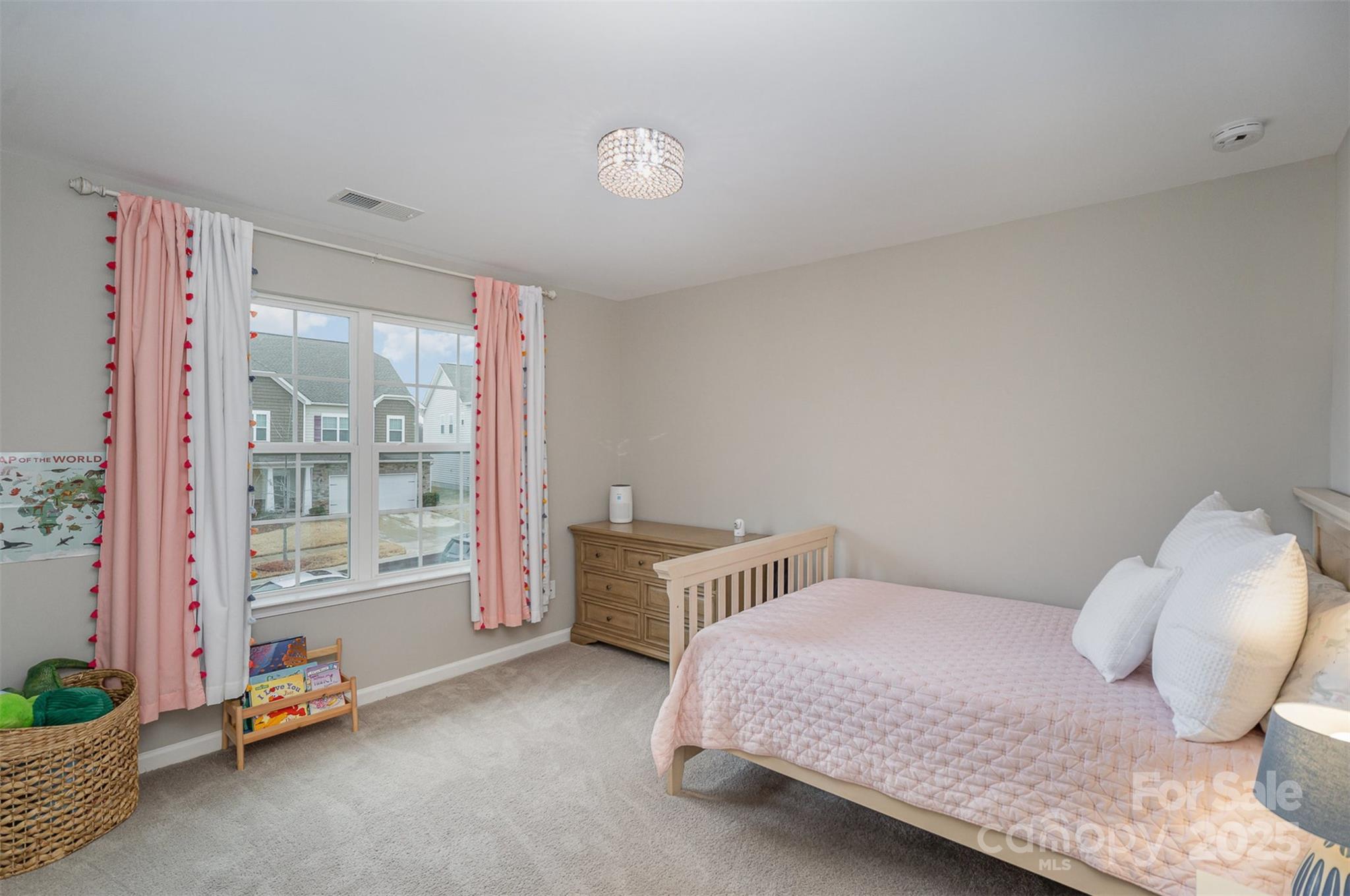 810 Braddock Way Fort Mill, SC 29715 - Photo 27 of 38 a bedroom with a bed and large windows