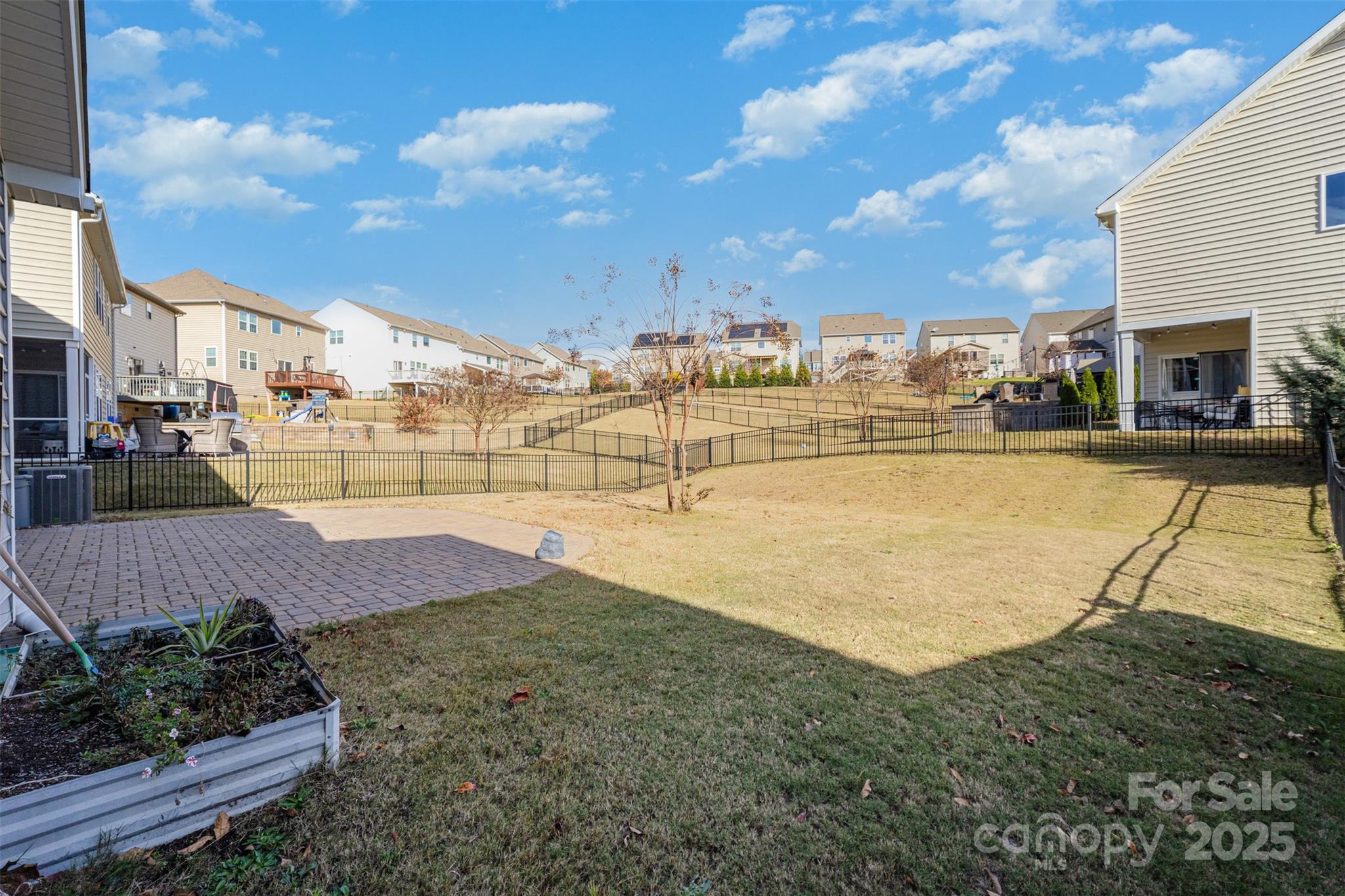 810 Braddock Way Fort Mill, SC 29715 - Photo 36 of 38 a view of a swimming pool with an outdoor space and seating area