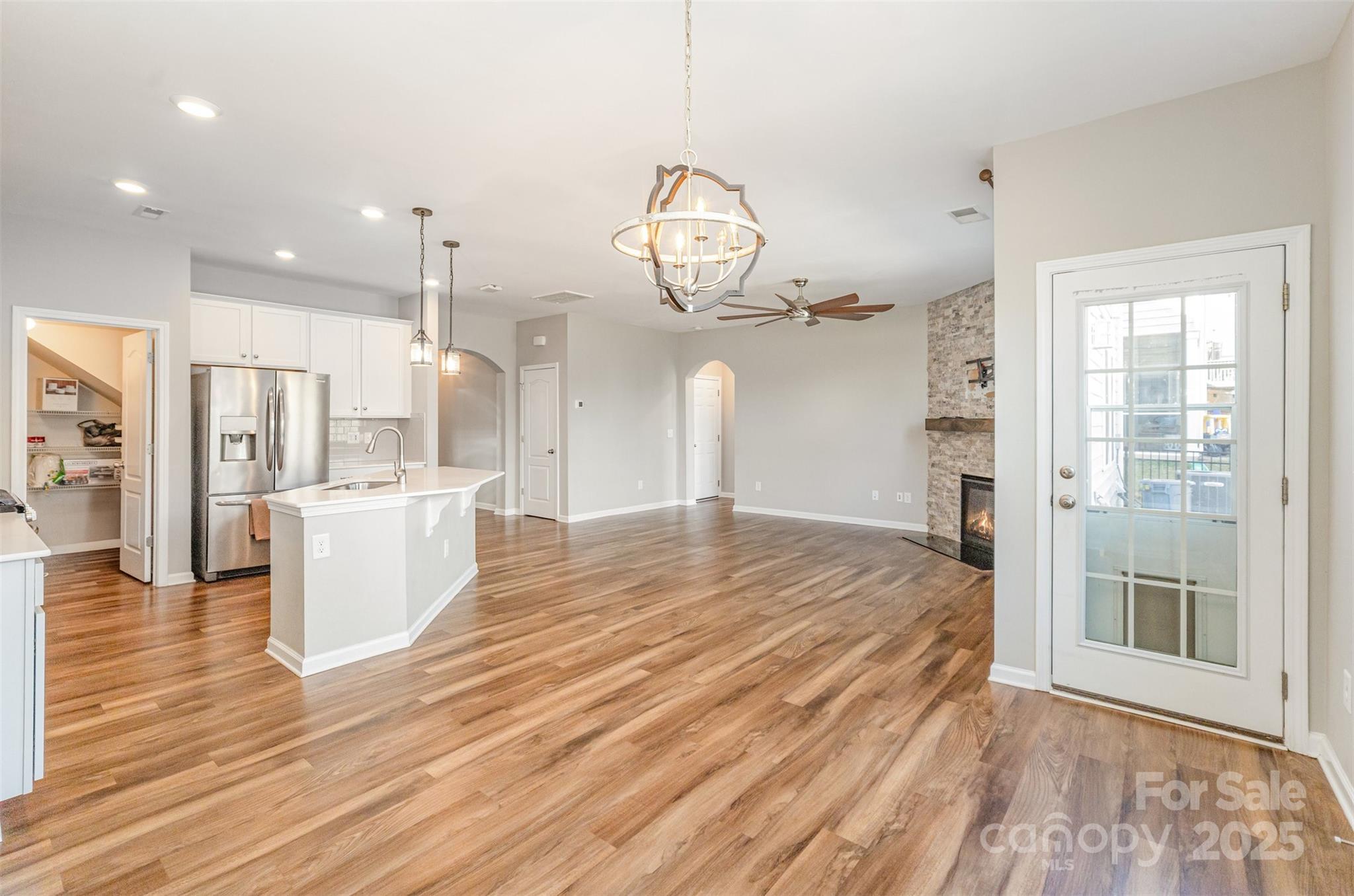 810 Braddock Way Fort Mill, SC 29715 - Photo 9 of 38 a view of a room with wooden floor and windows