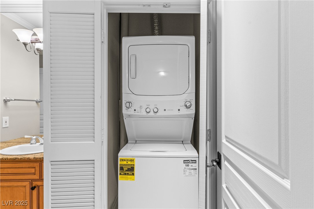 35 Strada Di Circolo Henderson, NV 89011 - Photo 22 of 28 Washroom featuring stacked washing machine and dryer