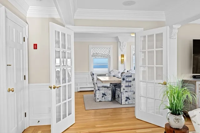 a view of a livingroom with furniture and a window