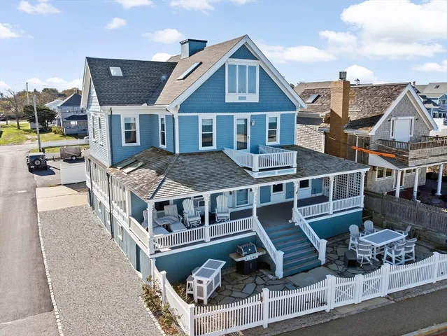an aerial view of a house with swimming pool