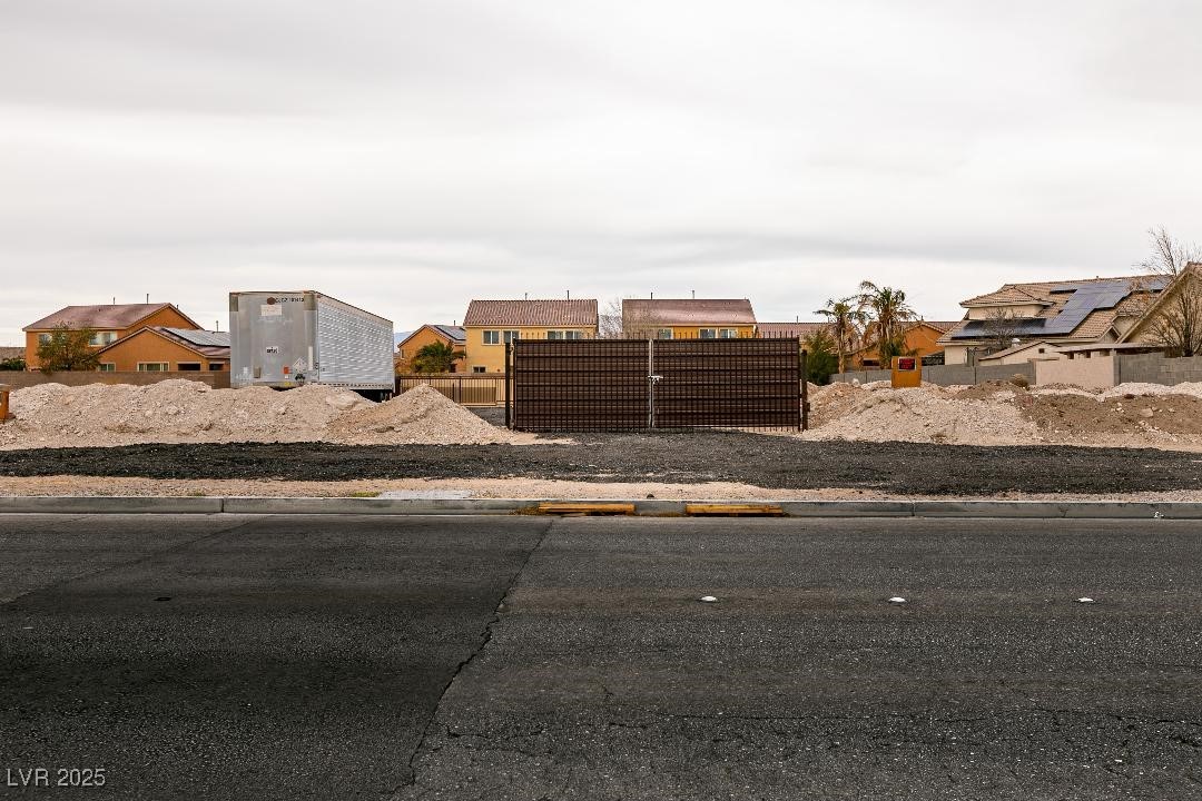 3834 West Gowan Road North Las Vegas, NV 89032 - Photo 13 of 17 Fenced front yard featuring a residential view