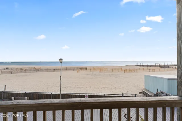 a kitchen with stainless steel appliances granite countertop a refrigerator a sink and a stove