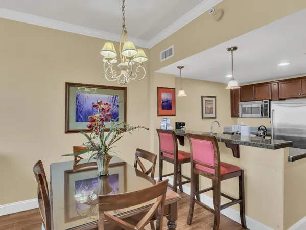 a view of a dining room with furniture