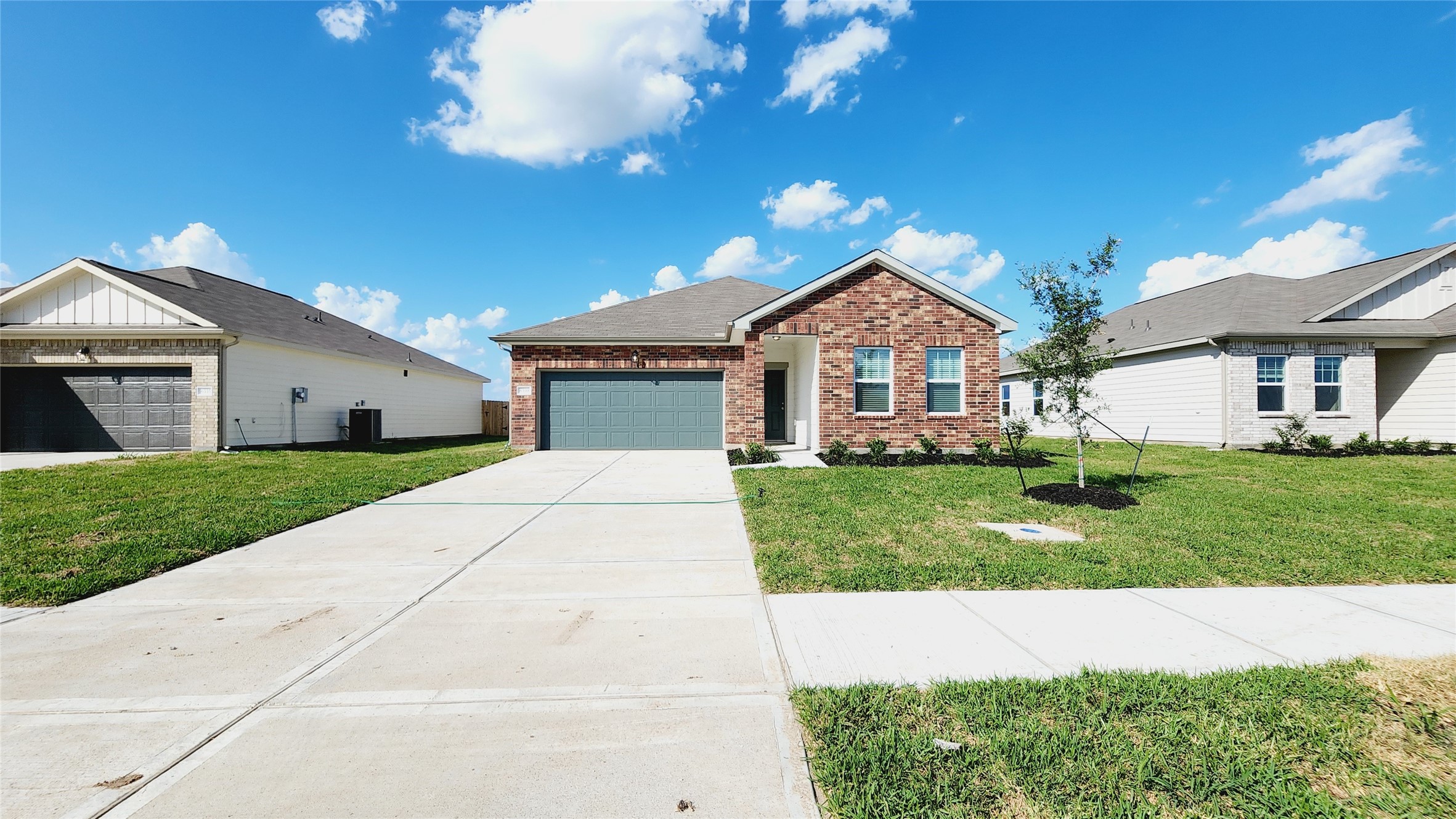 6339 Highland Trl Drive Richmond, TX 77469 - Photo 1 of 28 a front view of a house with a yard