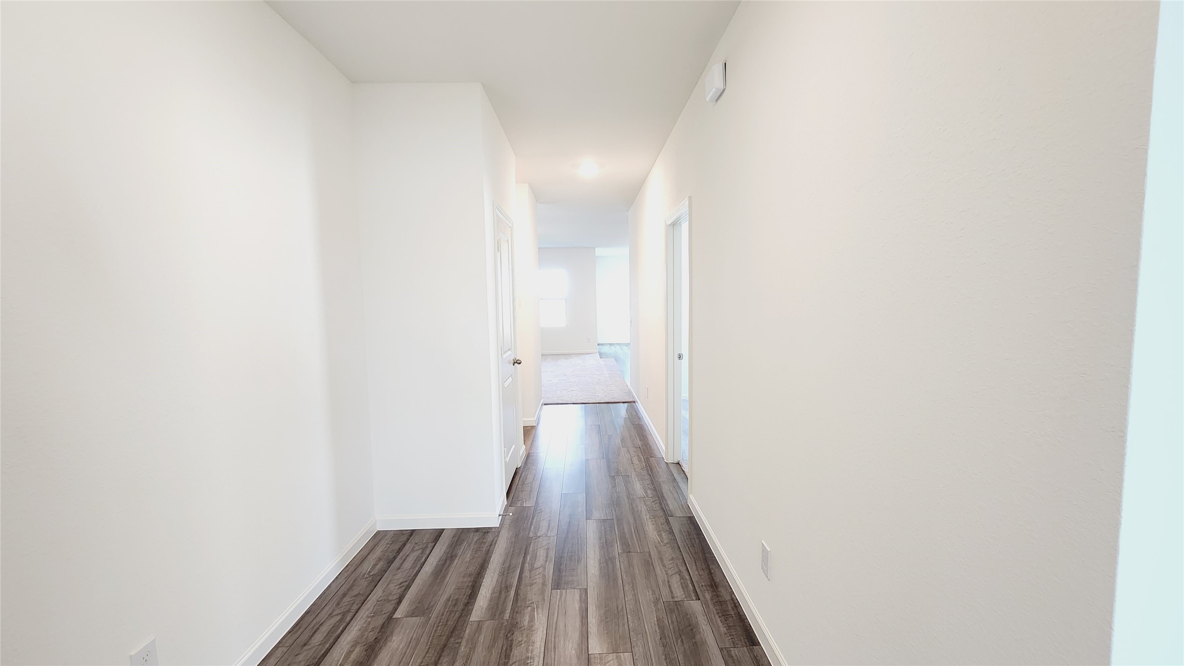 6339 Highland Trl Drive Richmond, TX 77469 - Photo 11 of 28 a view of a hallway with wooden floor