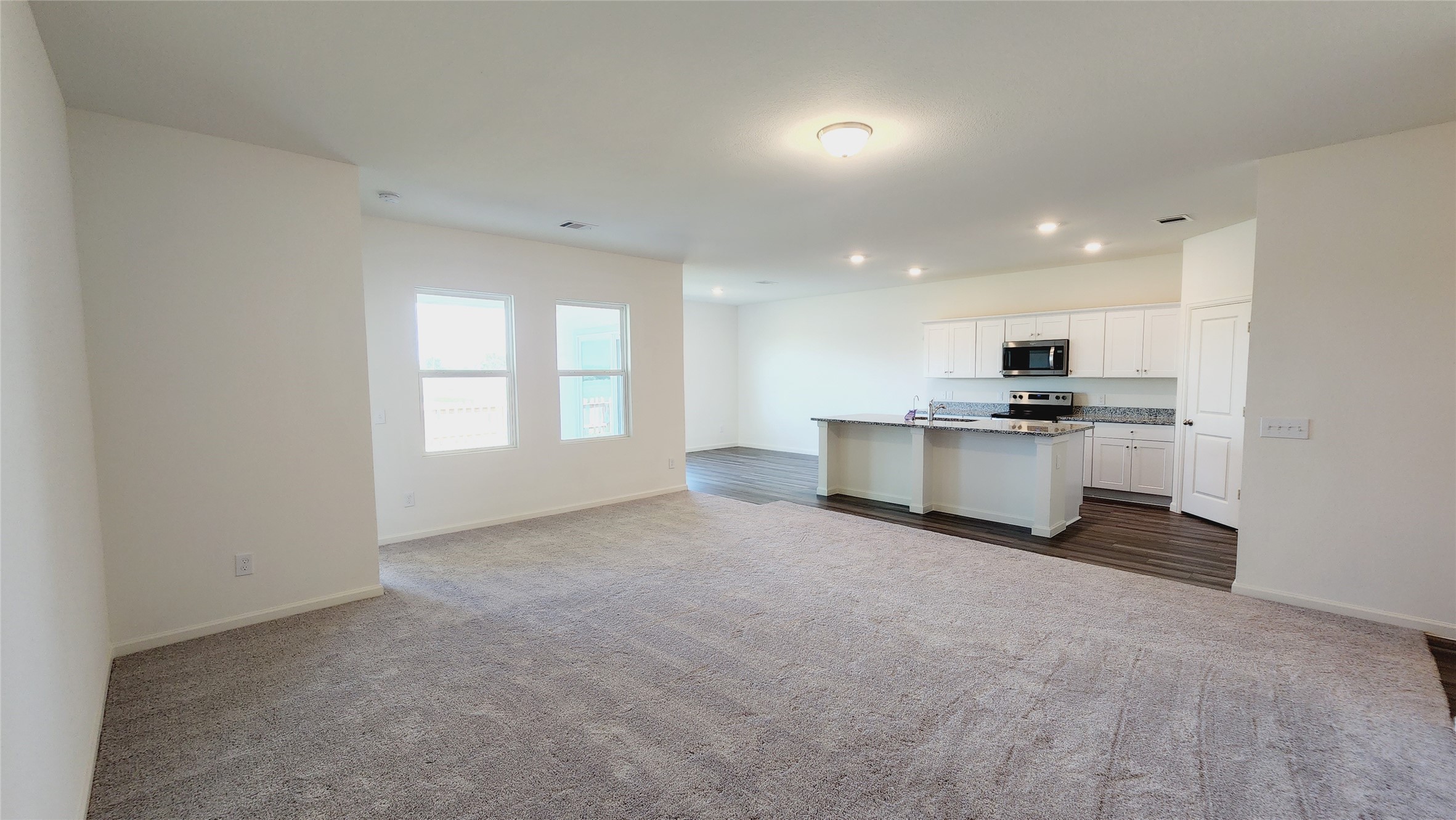6339 Highland Trl Drive Richmond, TX 77469 - Photo 12 of 28 a view of a kitchen with a sink stove and a window