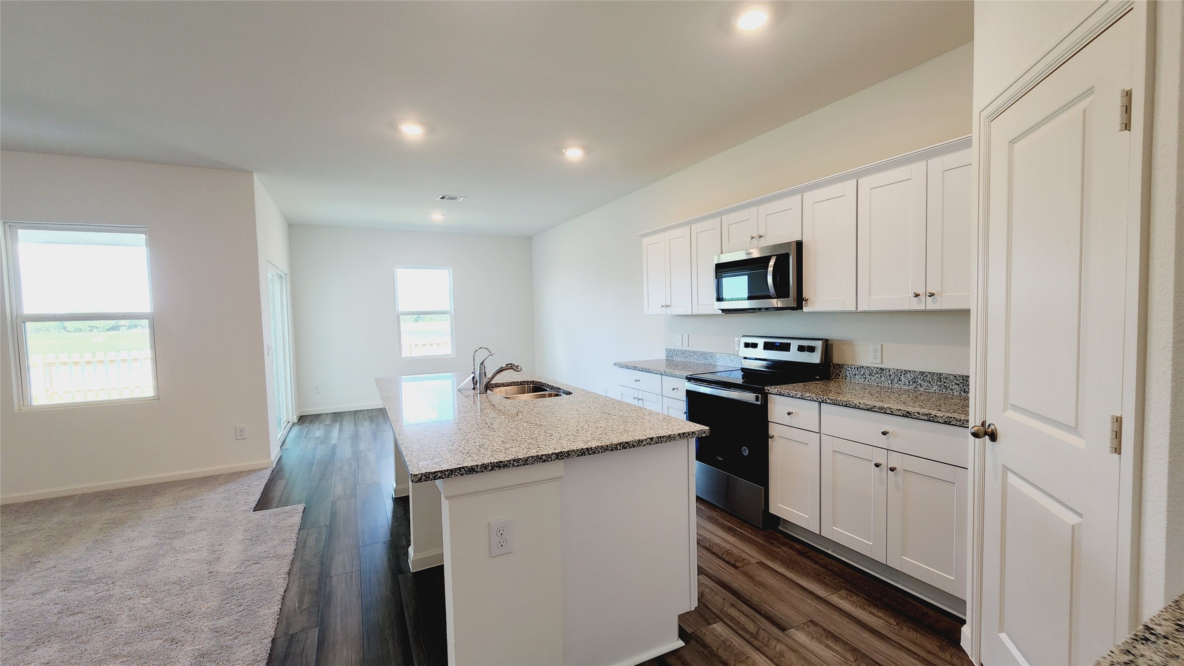6339 Highland Trl Drive Richmond, TX 77469 - Photo 15 of 28 a kitchen that has a sink and a stove top oven