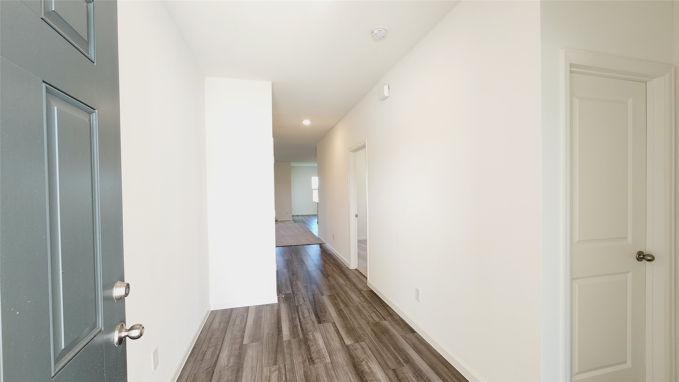 6339 Highland Trl Drive Richmond, TX 77469 - Photo 3 of 28 a view of a hallway with wooden floor