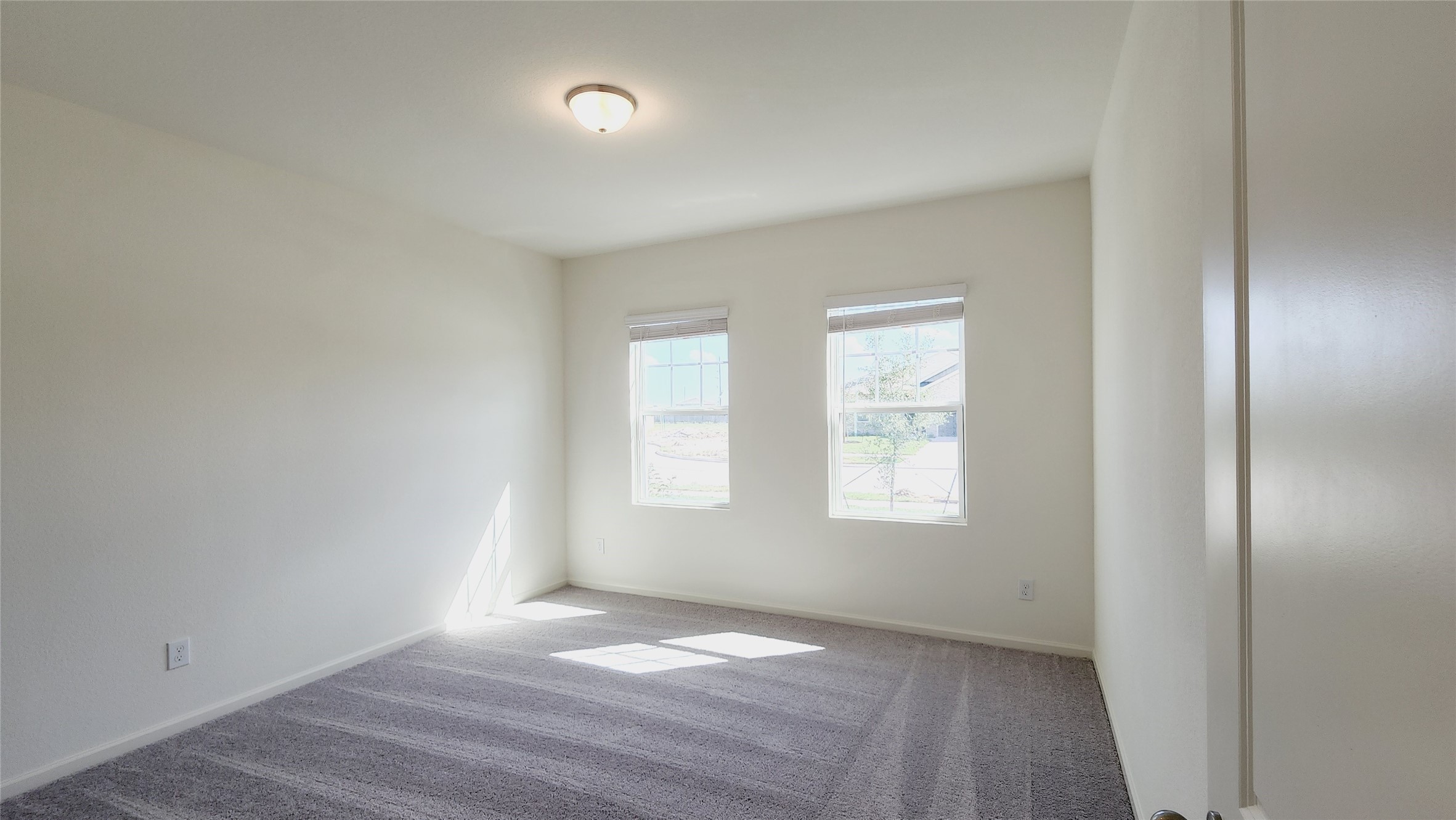 6339 Highland Trl Drive Richmond, TX 77469 - Photo 5 of 28 an empty room with windows