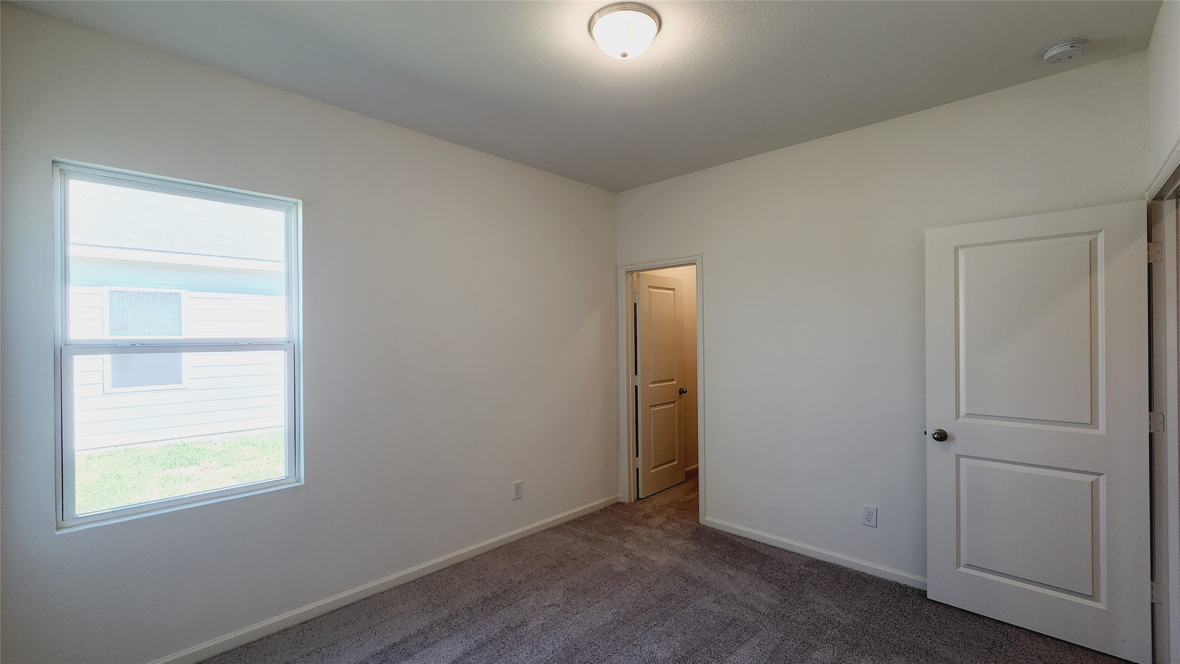 6339 Highland Trl Drive Richmond, TX 77469 - Photo 10 of 28 an empty room with windows and closet