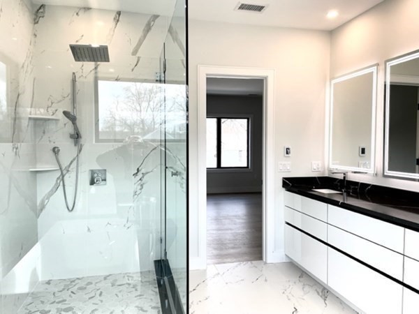 21 Tocci Path Newton, MA 02459 - Photo 14 of 24 a kitchen with granite countertop a sink and a stove