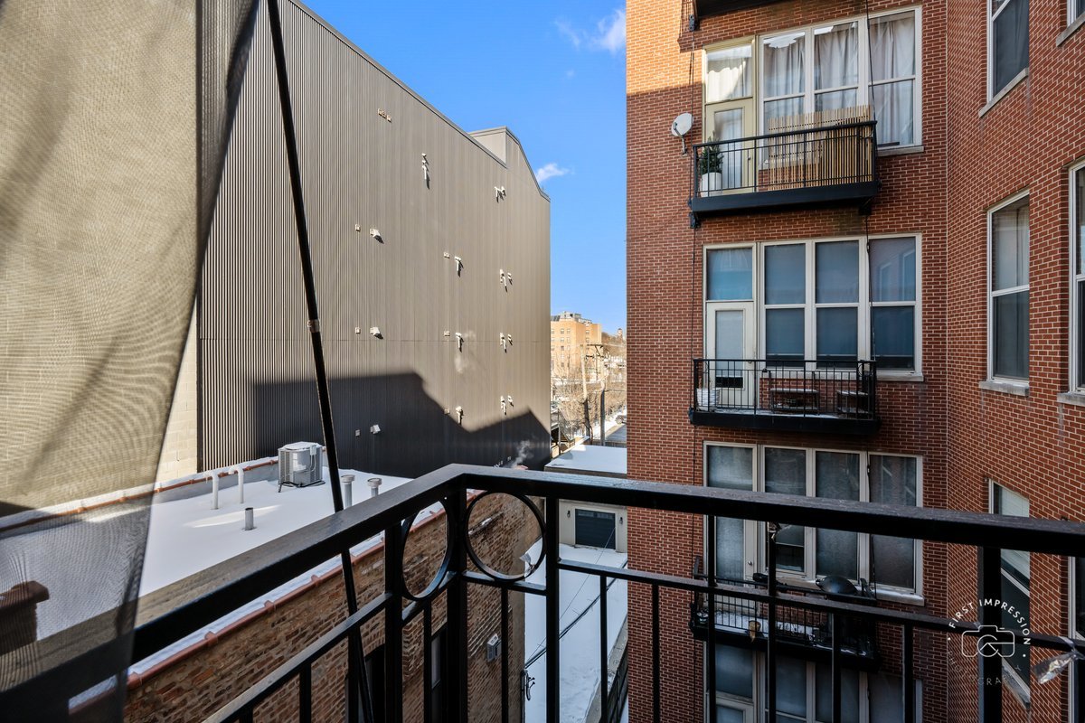 1500 West Monroe Street, Unit 409 Chicago, IL 60607 - Photo 17 of 20 a view of balcony and patio