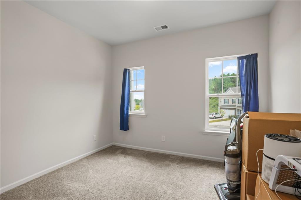 10 Kane Drive Jasper, GA 30143 - Photo 13 of 24 a view of a room with gym equipment and a window