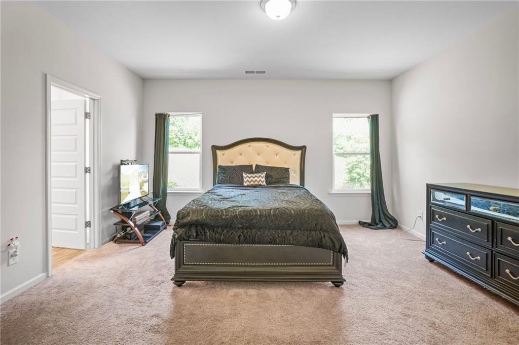 10 Kane Drive Jasper, GA 30143 - Photo 15 of 24 a bedroom with a bed and dresser