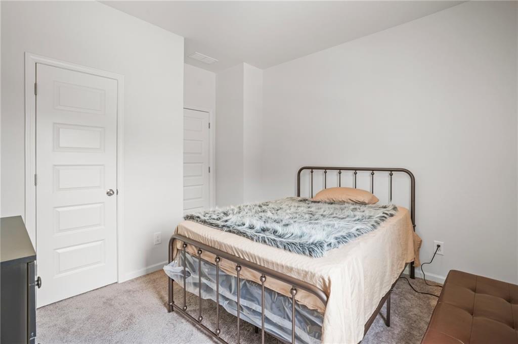 10 Kane Drive Jasper, GA 30143 - Photo 19 of 24 a bedroom with a bed and a window