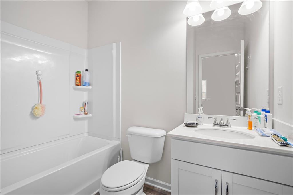 10 Kane Drive Jasper, GA 30143 - Photo 20 of 24 a bathroom with a sink a toilet and shower