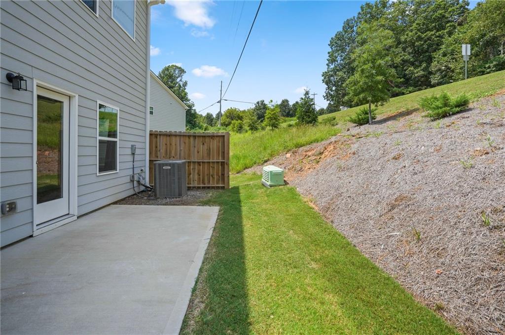 10 Kane Drive Jasper, GA 30143 - Photo 24 of 24 a view of a house with backyard and a garden