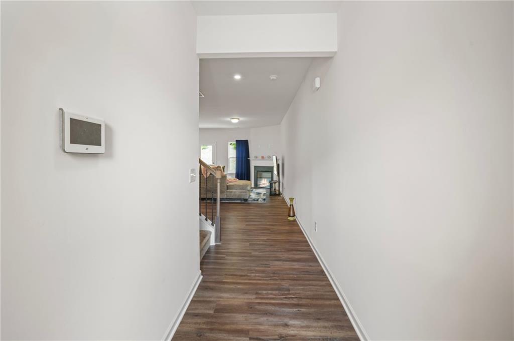 10 Kane Drive Jasper, GA 30143 - Photo 4 of 24 a view of a hallway with wooden floor and staircase