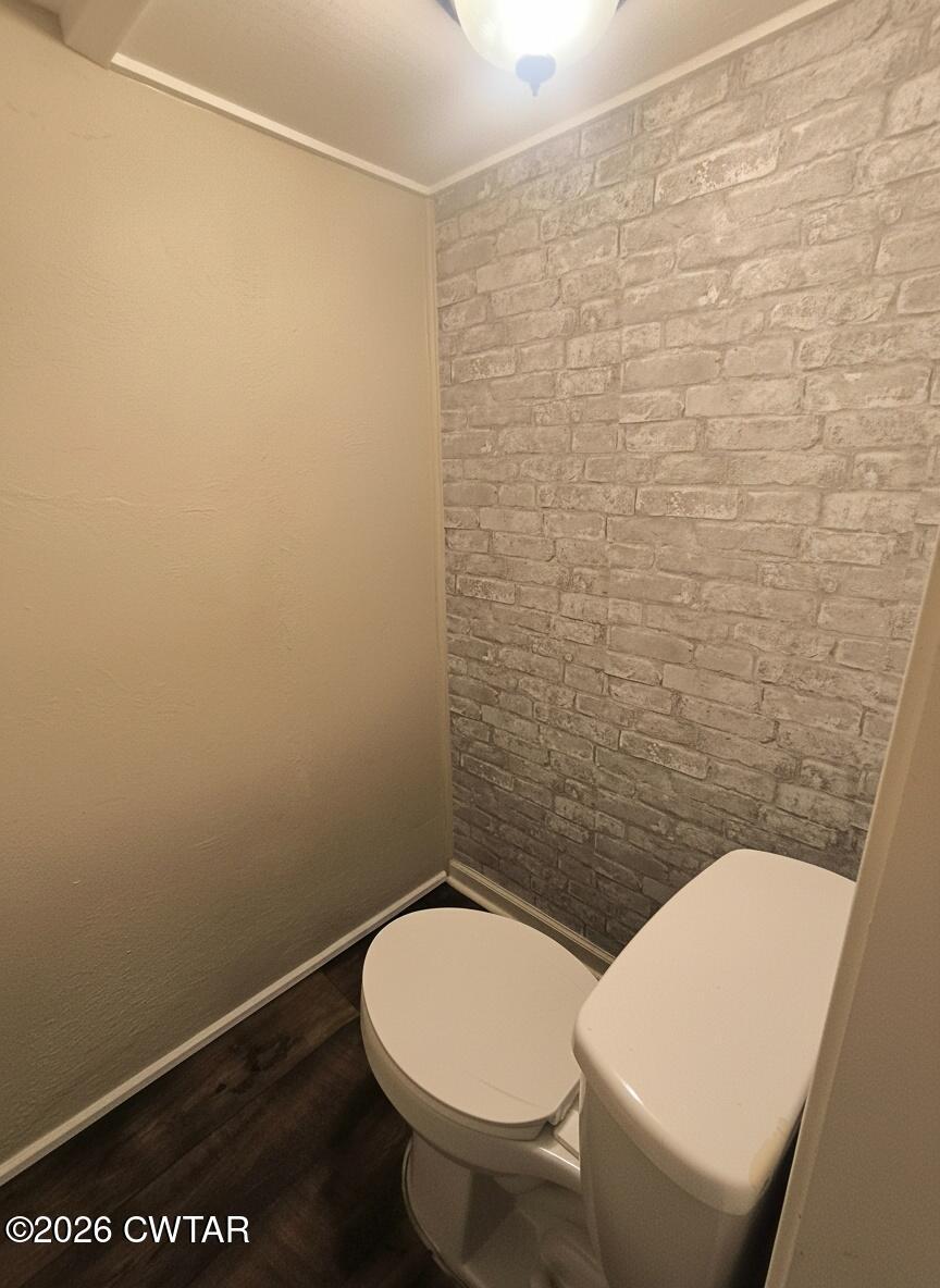 513 Viar Road Dyersburg, TN 38024 - Photo 34 of 37 a white toilet sitting next to a white wall