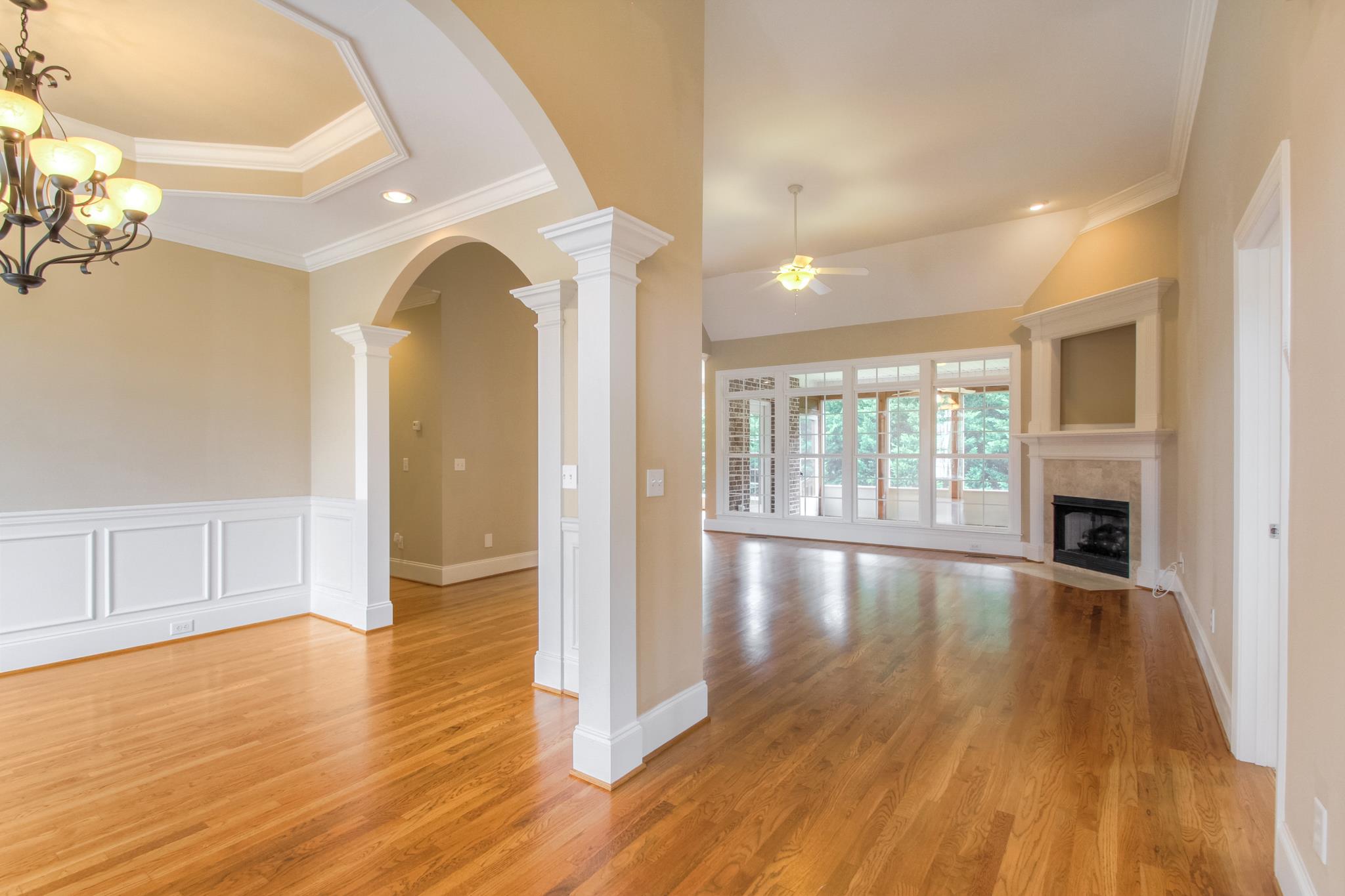 1631 Fair House Road Spring Hill, TN 37174 - Photo 1 of 29 a view of empty room with wooden floor and fireplace