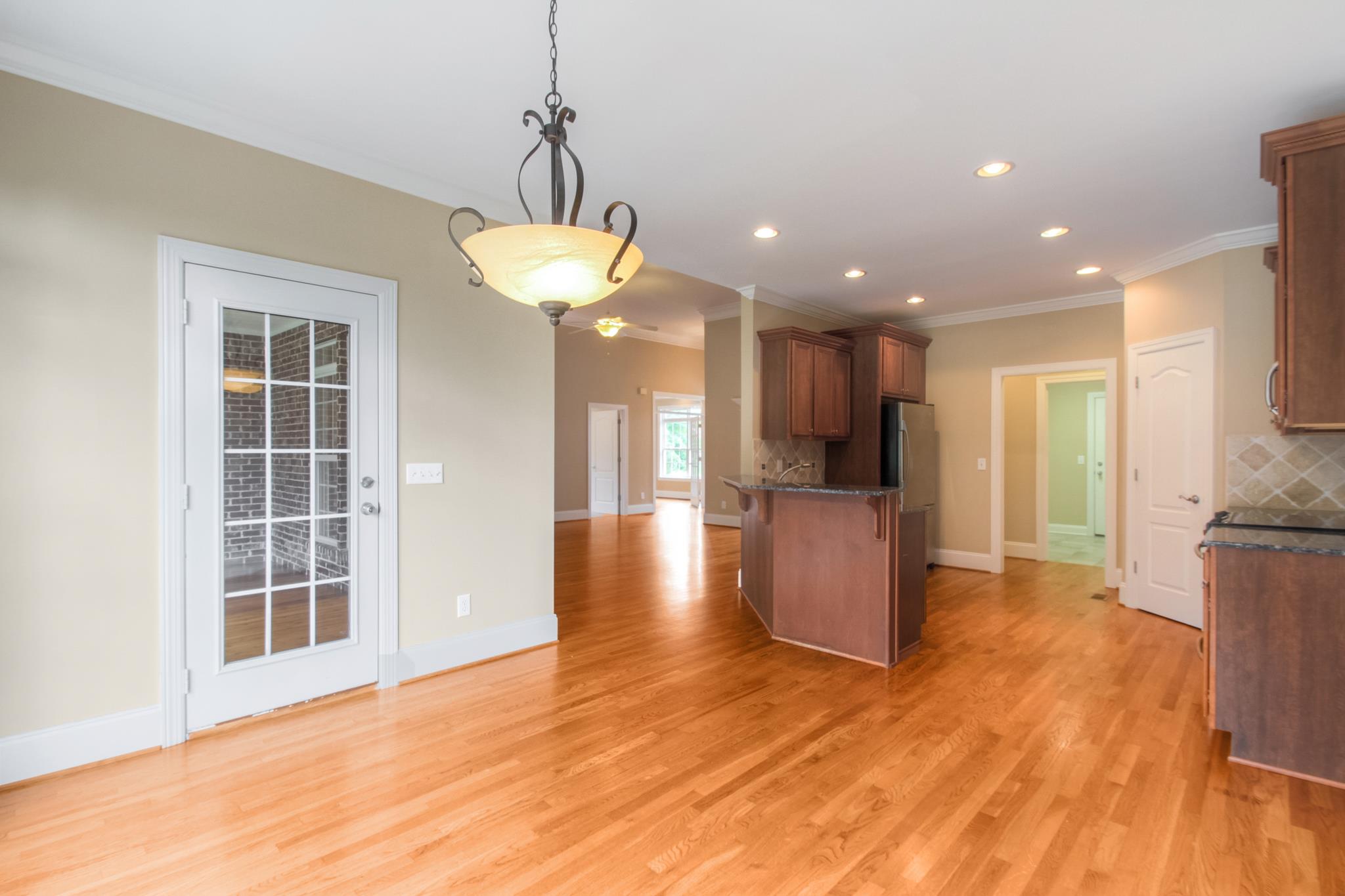 1631 Fair House Road Spring Hill, TN 37174 - Photo 14 of 29 a view of a kitchen with a sink and a refrigerator