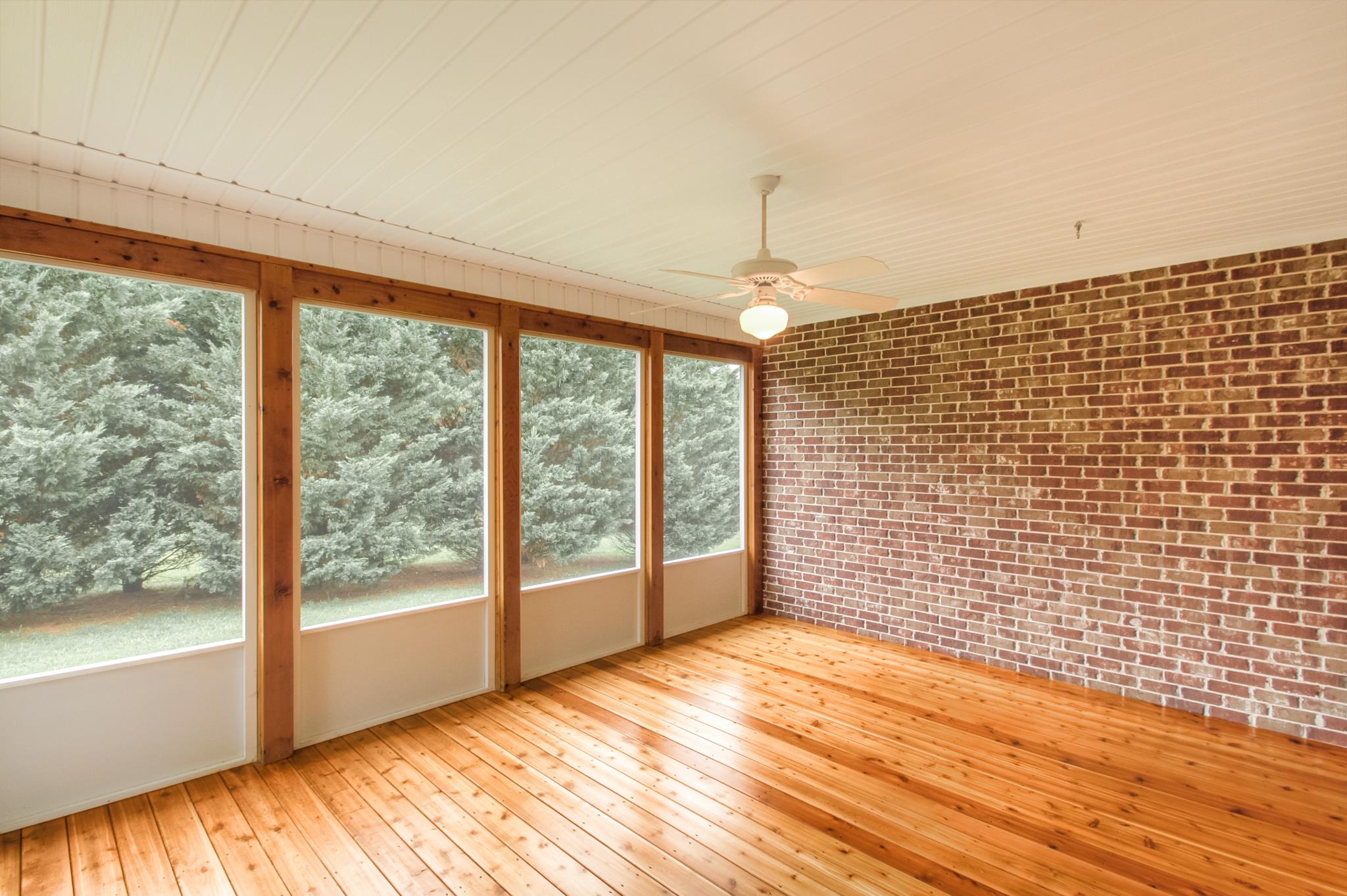 1631 Fair House Road Spring Hill, TN 37174 - Photo 15 of 29 a view of empty room with wooden floor and fan