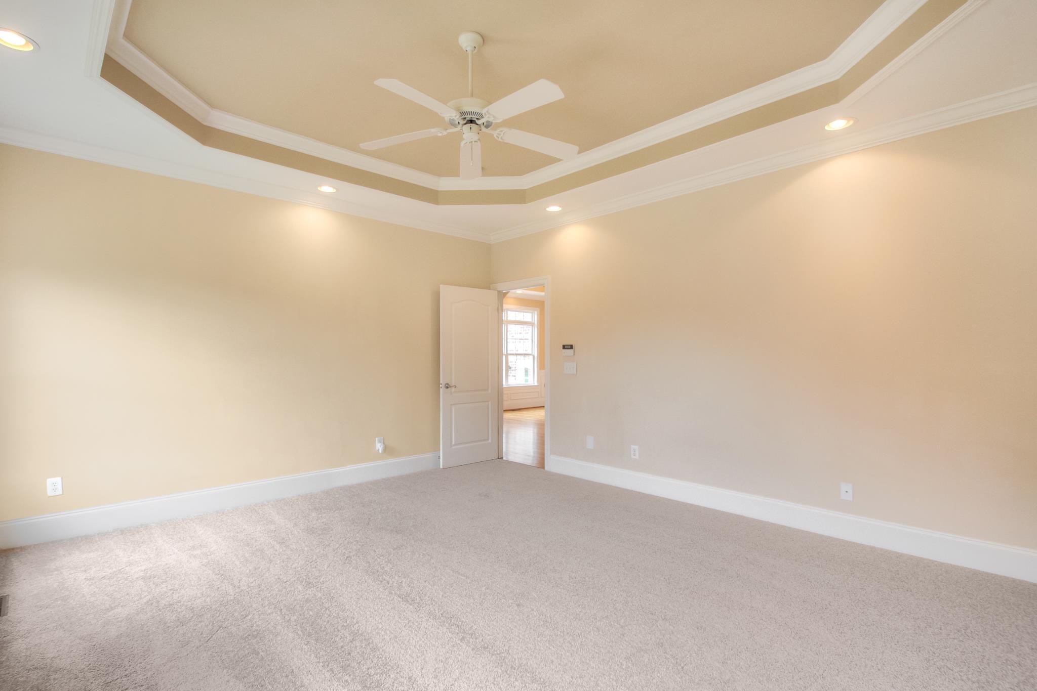 1631 Fair House Road Spring Hill, TN 37174 - Photo 18 of 29 an empty room with a ceiling fan and a window