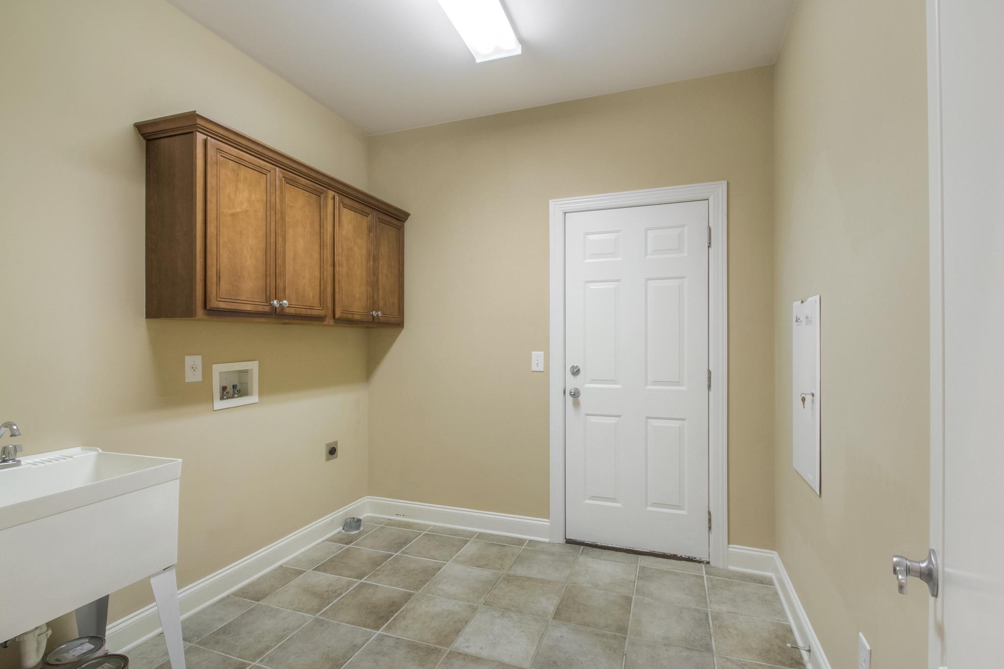 1631 Fair House Road Spring Hill, TN 37174 - Photo 25 of 29 a view of an empty room with closet and a window