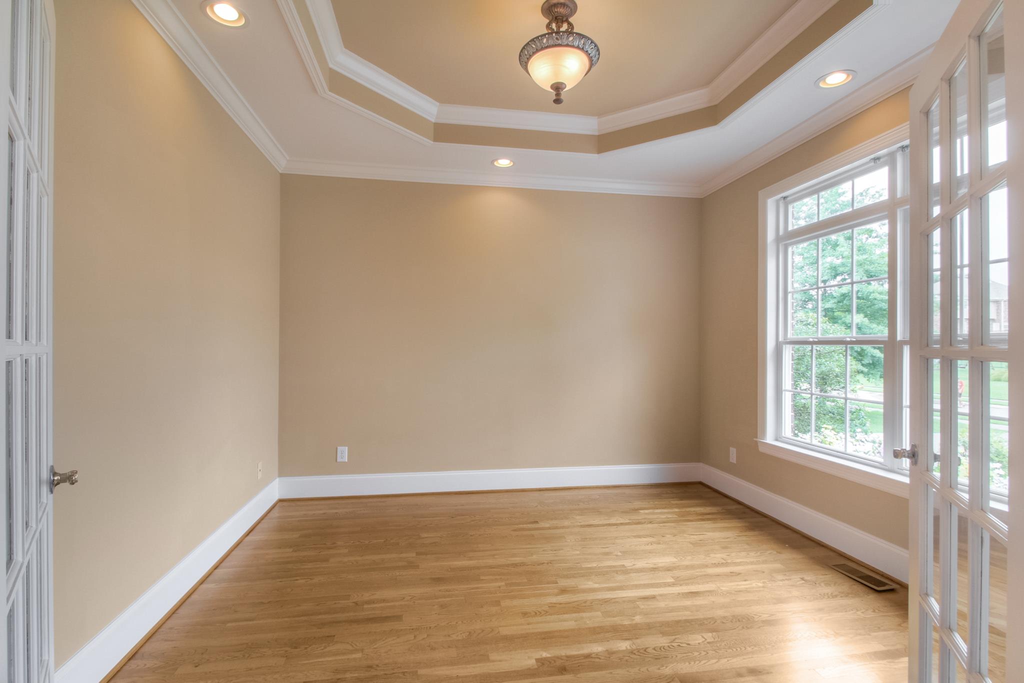1631 Fair House Road Spring Hill, TN 37174 - Photo 7 of 29 wooden floor in an empty room with a window