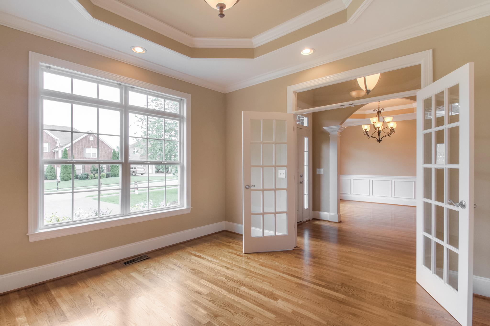 1631 Fair House Road Spring Hill, TN 37174 - Photo 8 of 29 a view of empty room with wooden floor and fan