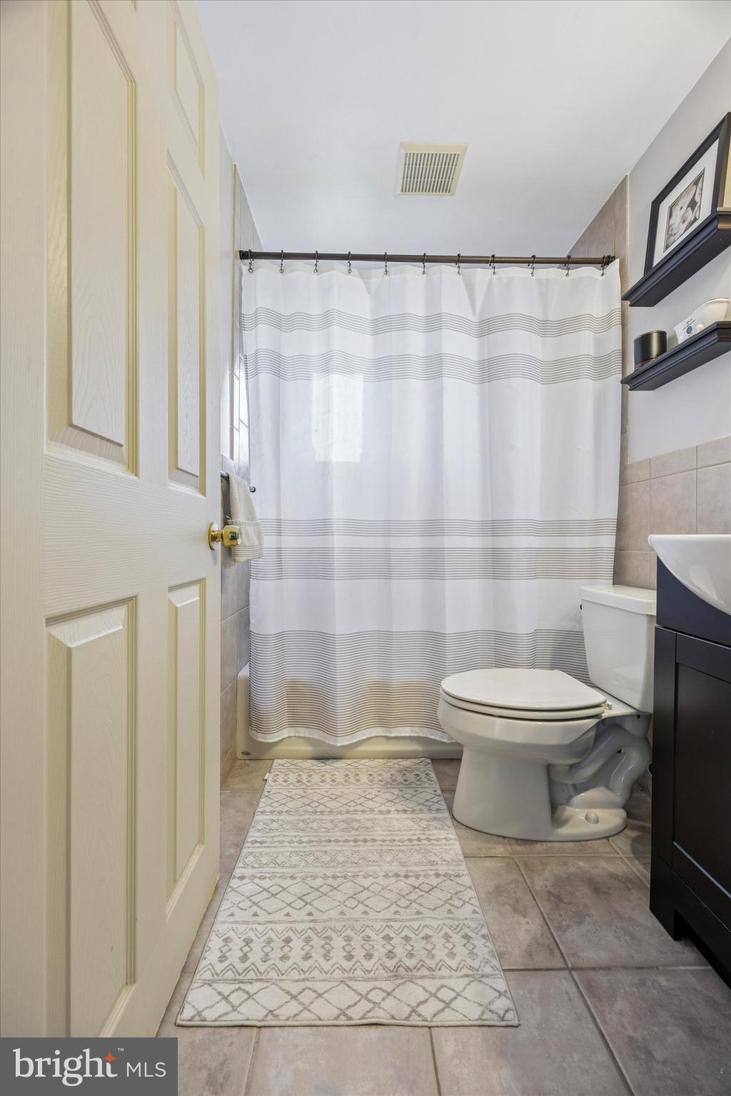 539 Overlook Road Philadelphia, PA 19128 - Photo 13 of 25 a bathroom with a toilet and a shower
