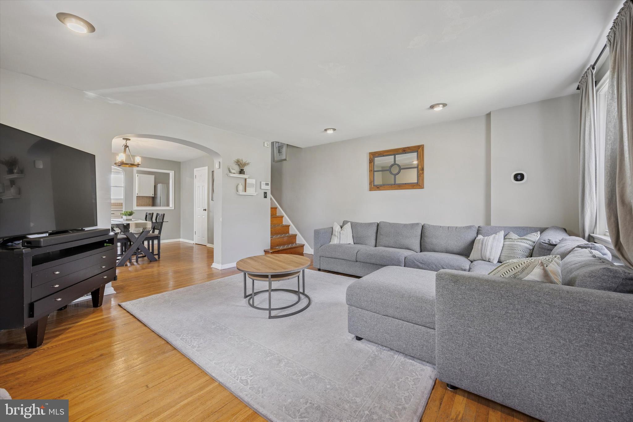 539 Overlook Road Philadelphia, PA 19128 - Photo 3 of 25 a living room with furniture and a flat screen tv
