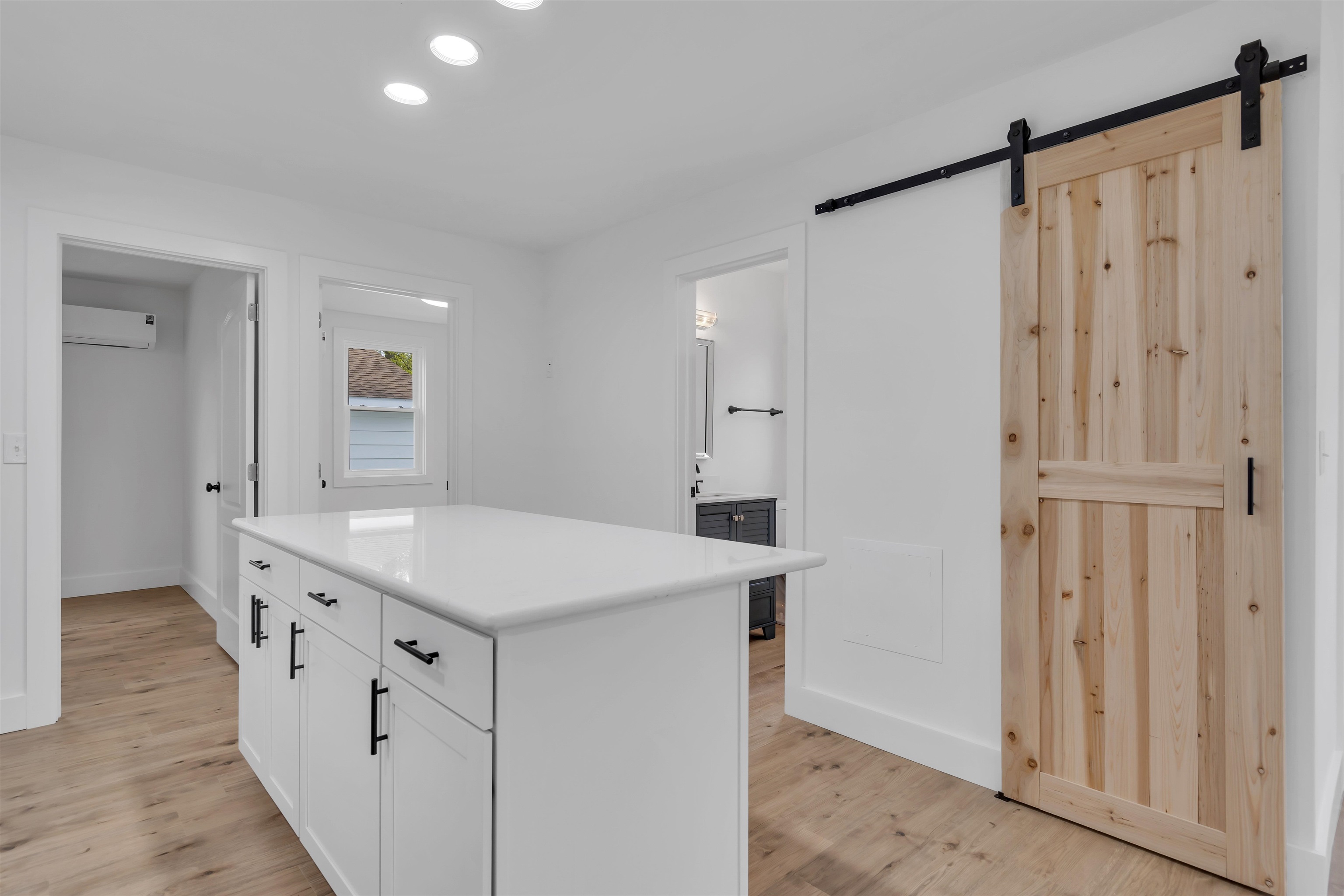 539 Seashore Road Erma, NJ 08204 - Photo 5 of 18 a kitchen with white cabinets and sink
