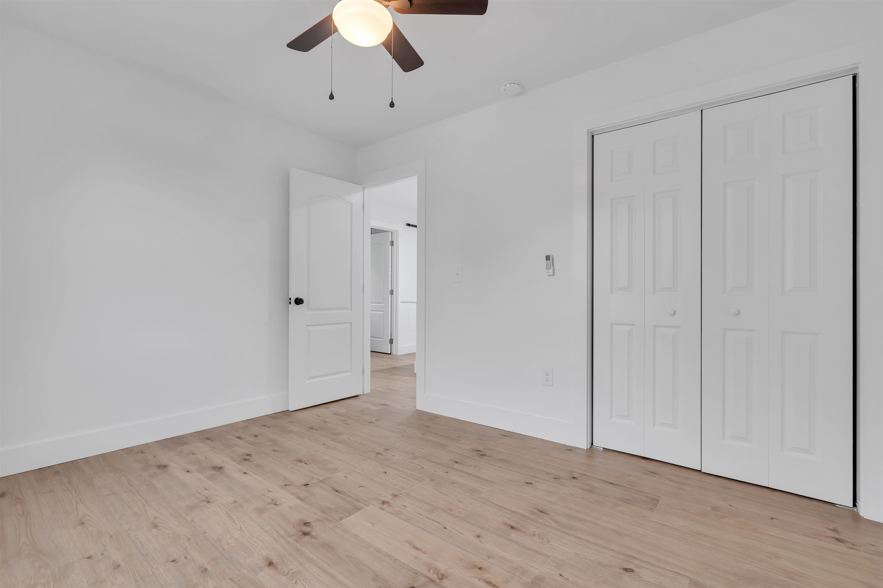 539 Seashore Road Erma, NJ 08204 - Photo 10 of 18 a view of an empty room and chandelier fan
