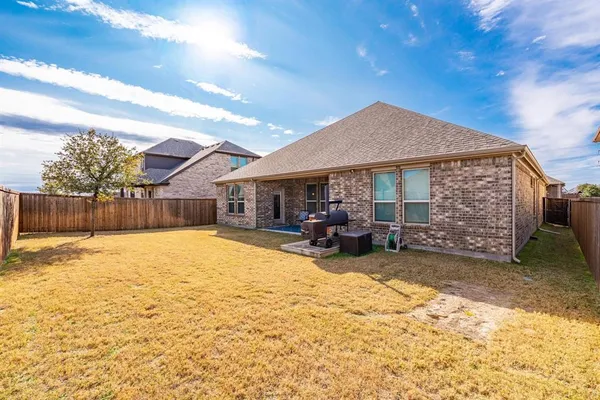 a view of a house with outdoor space and sitting space