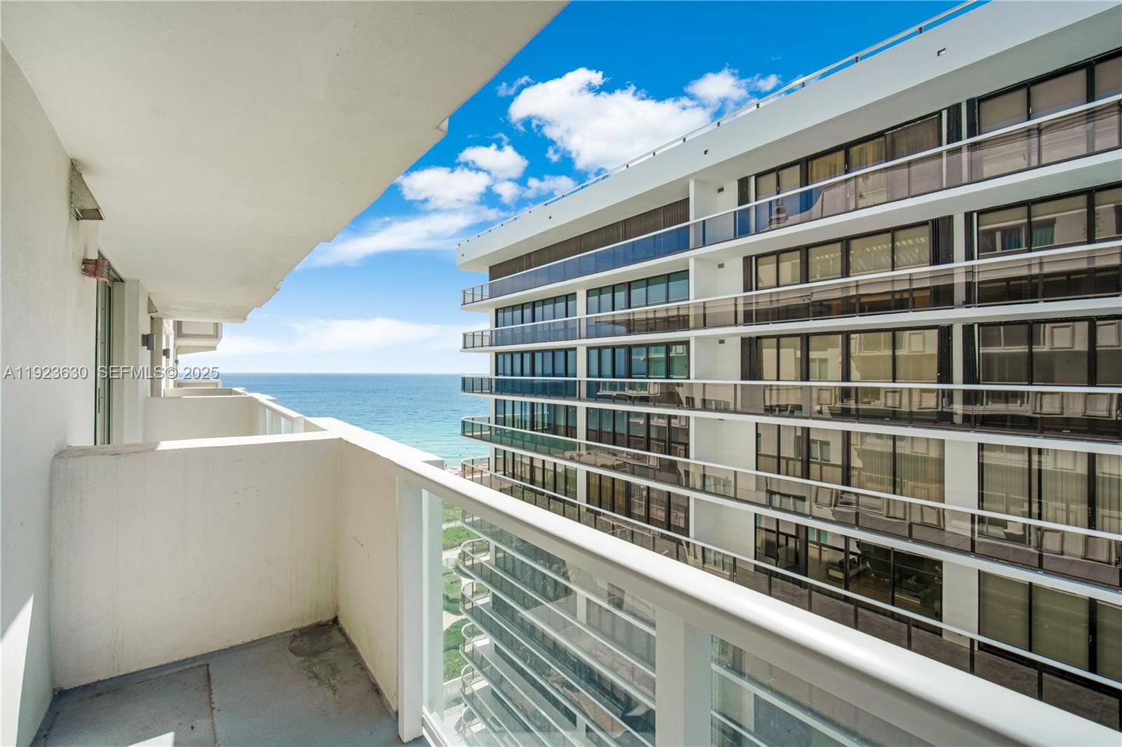 9499 Collins Avenue, Unit 1005 Surfside, FL 33154 - Photo 17 of 35 a view of a building from a balcony