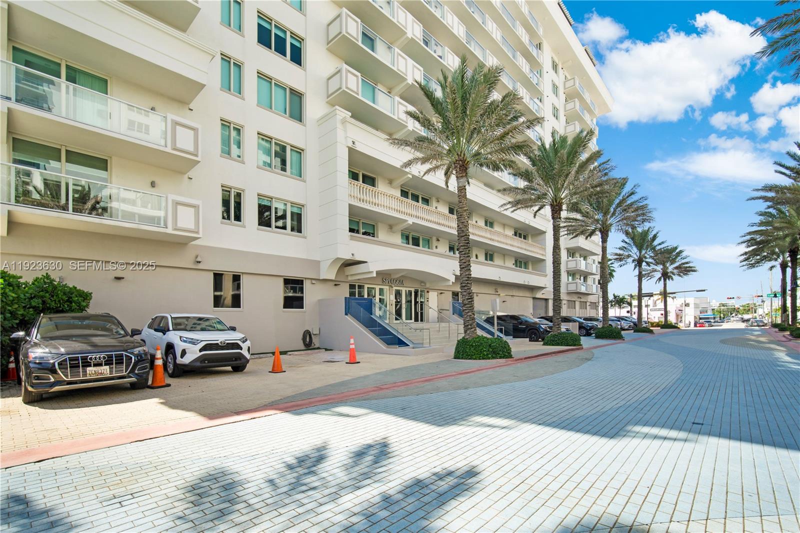 9499 Collins Avenue, Unit 1005 Surfside, FL 33154 - Photo 25 of 35 a cars parked on the side of a street