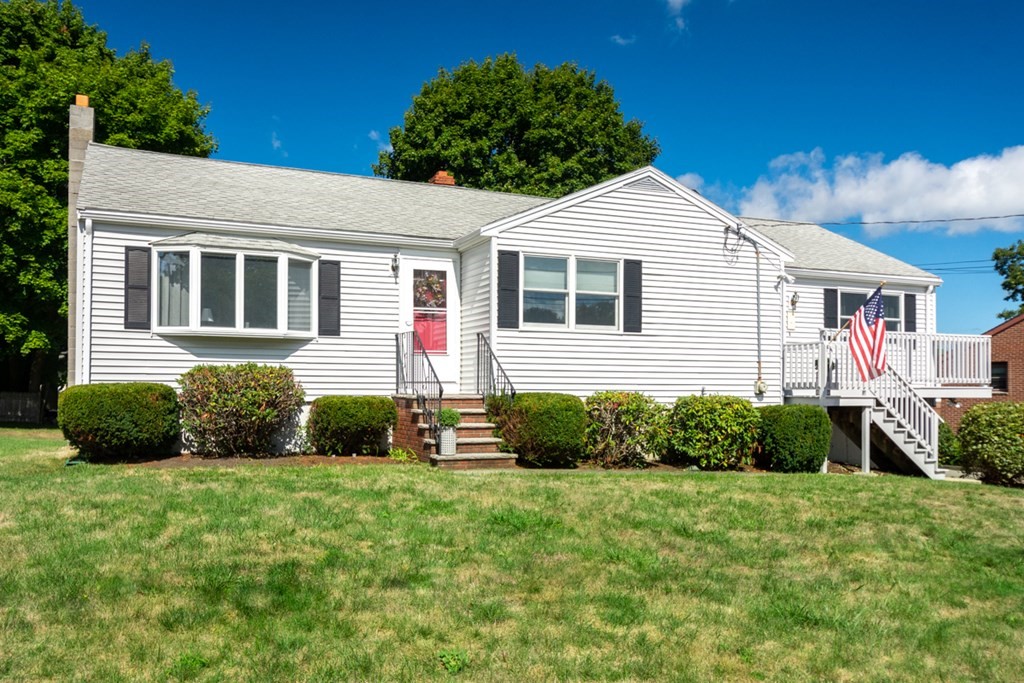 29 Anna Road Woburn, MA 01801 - Photo 1 of 29 a front view of a house with a yard